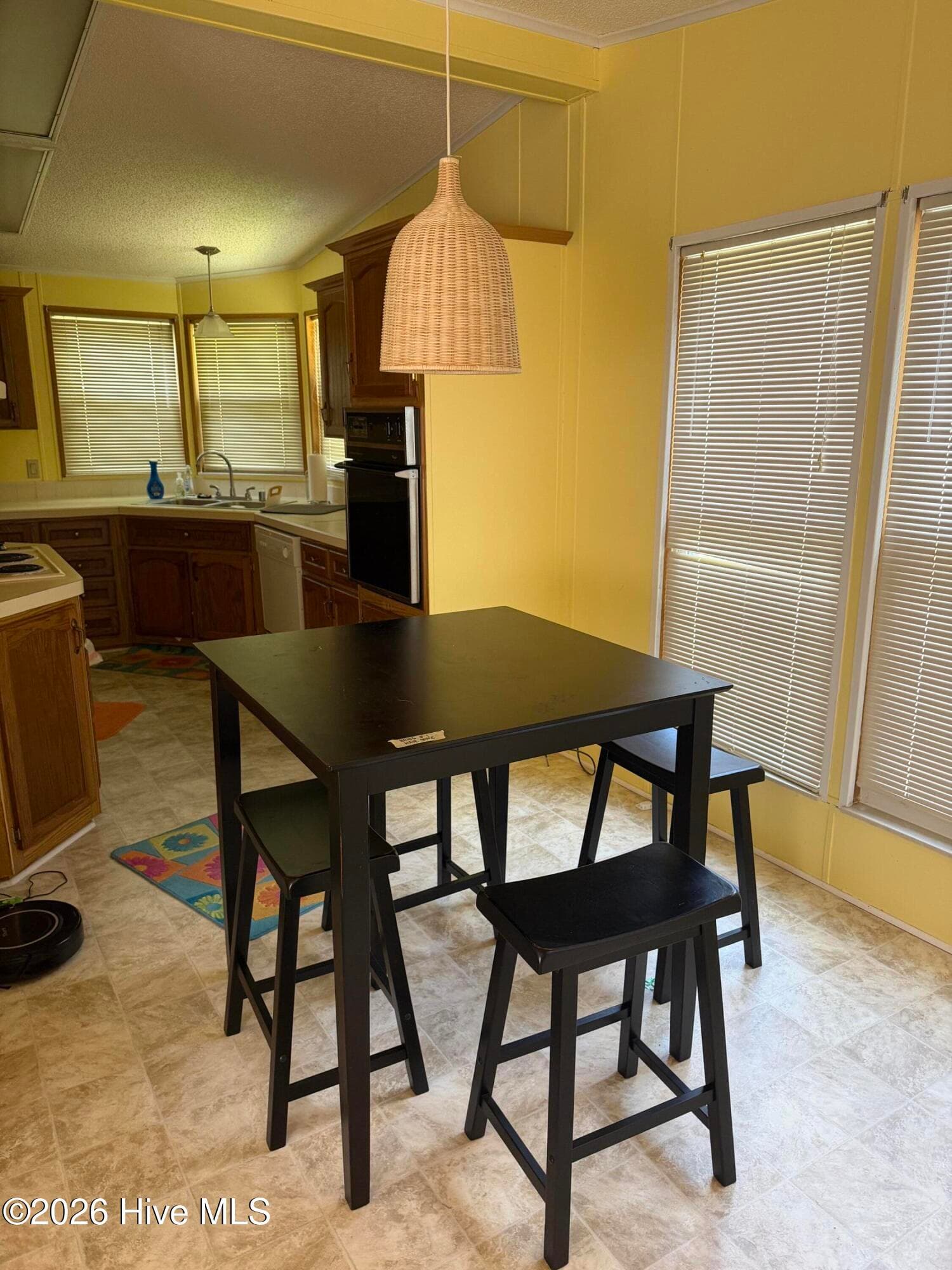 from dining looking towards kitchen - 606 Galley Court, Hampstead, NC 28443
