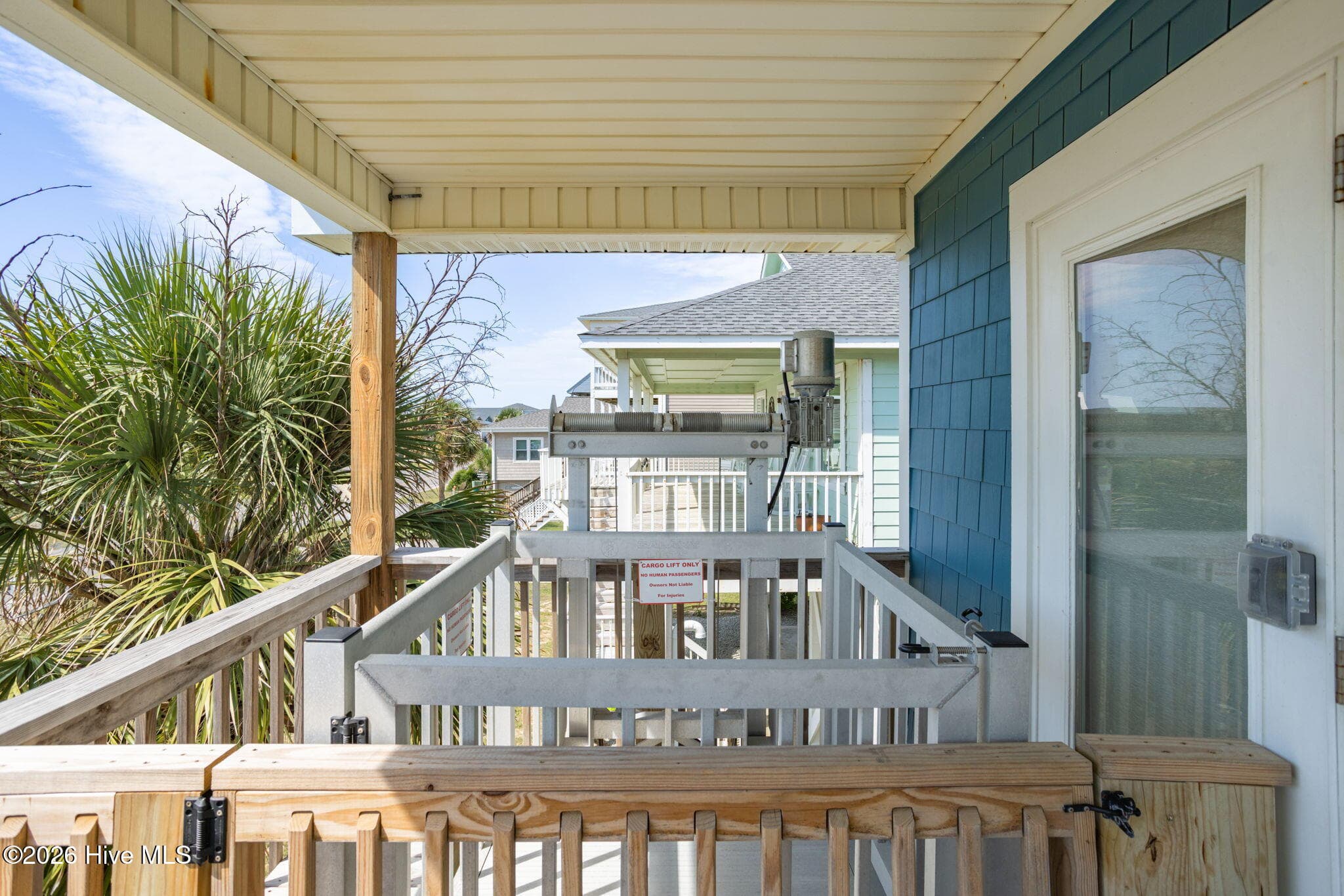 Ground level covered patio - 2330 W Beach Drive, Oak Island, NC 28465