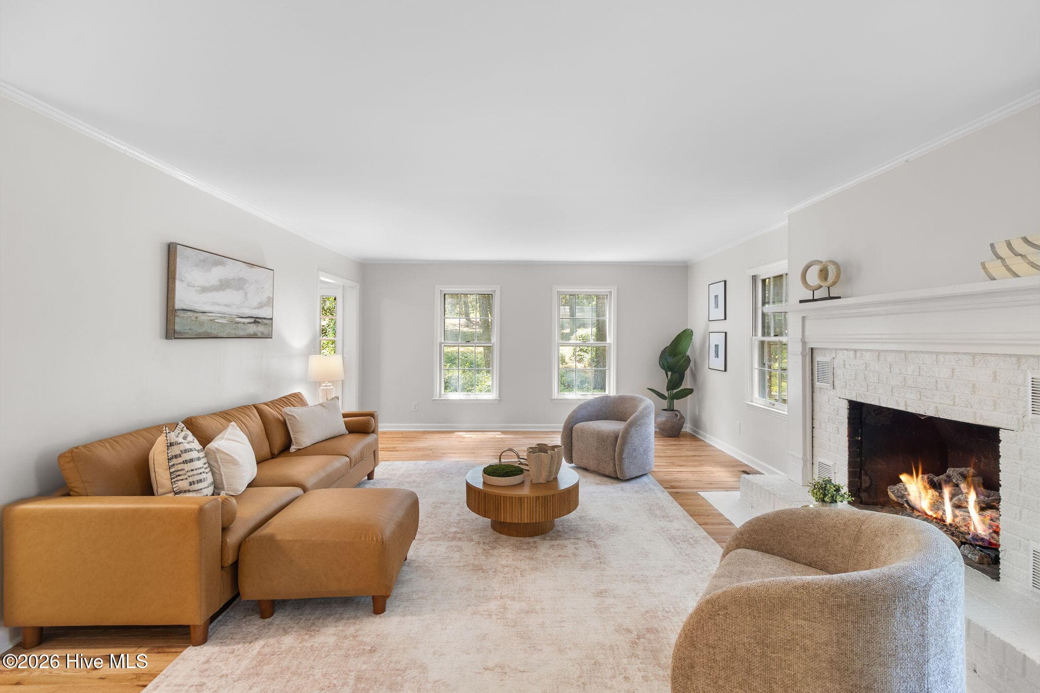 Living room with gas log fireplace - 102 James Creek Road, Southern Pines, NC 28387