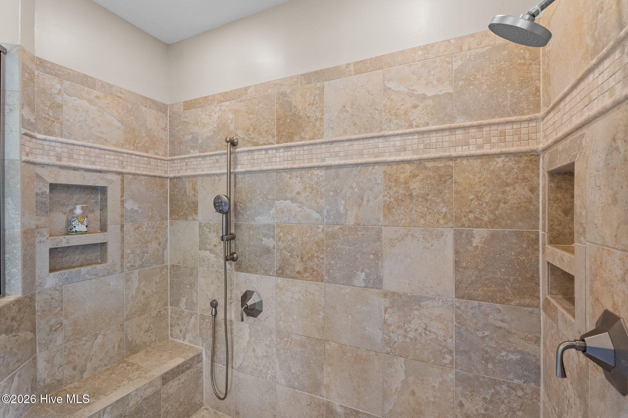 Beautiful neutral tile in shower - 3858 Ridge Crest Drive, Southport, NC 28461