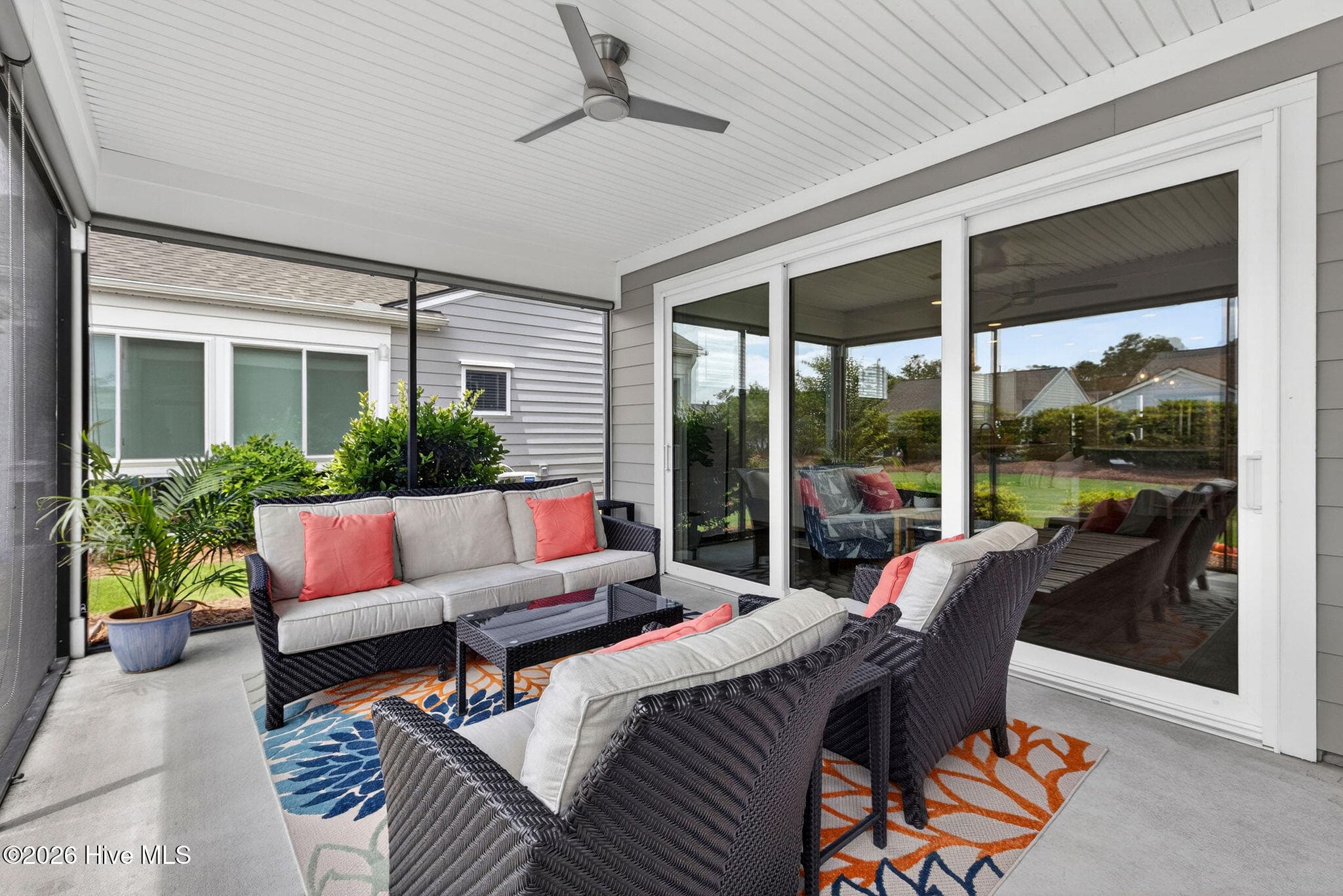 Screened porch with pull down shades - 858 Broomsedge Terrace, Wilmington, NC 28412
