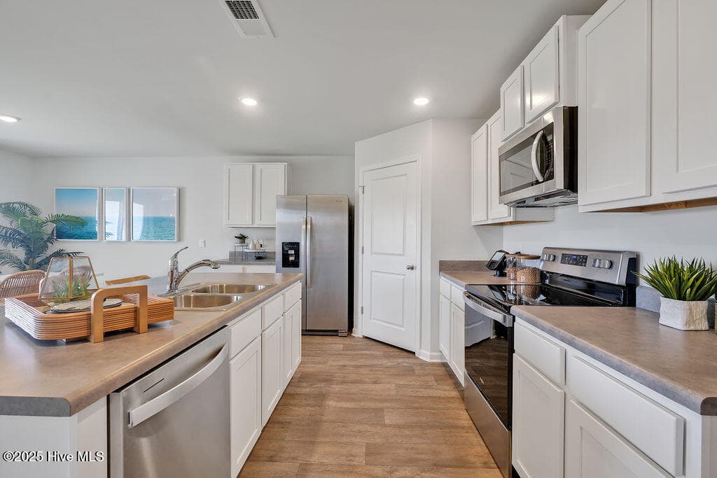 The photos you see here are for illustration purposes only, interior and exterior features, options, colors and selections will vary from the homes as built. - 1110 Pampas Grass Drive Lot 340, Castle Hayne, NC 28429