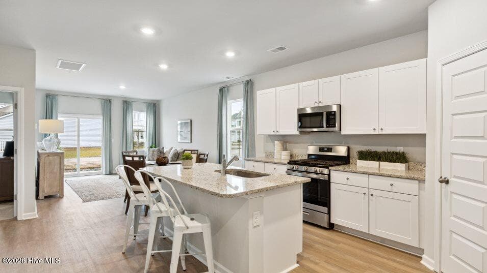 Images shown are artist's rendering and may contain options that are not standard on all models or not included in the purchase price. Prices, dimensions and features may vary and are subject to change. Photos are for illustrative purposes only. - 2176 Wild Indigo Circle NW Lot 182, Calabash, NC 28467