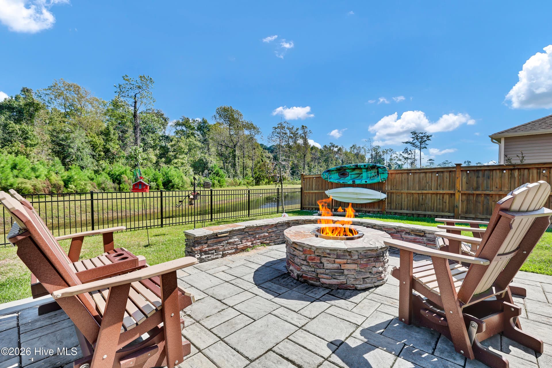 View of Stone Fire Pit & Seating - 512 Edgewater Way, Surf City, NC 28445