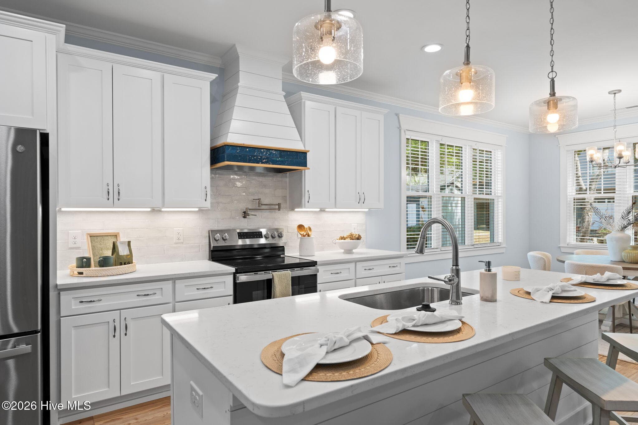 Photos of a staged model of the exact same plan - 312 NE 58th Street, Oak Island, NC 28465