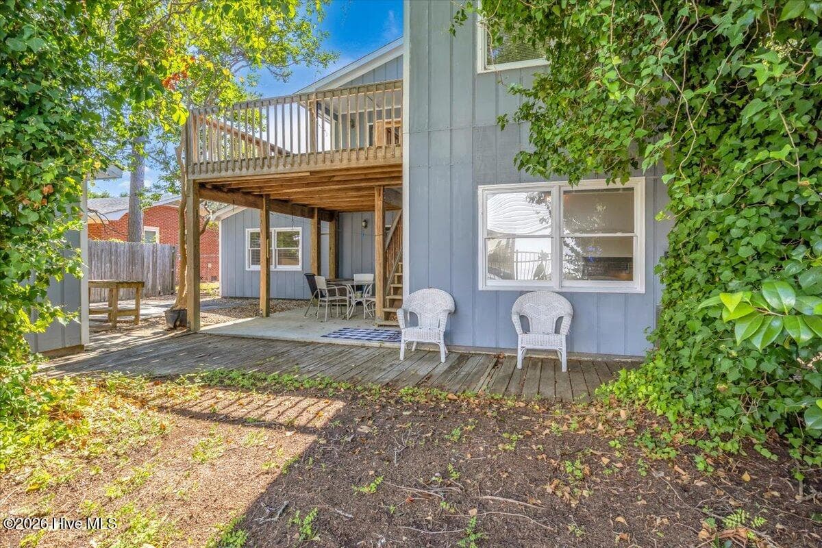 View of back patio and upper deck - 109 NE 30th Street, Oak Island, NC 28465