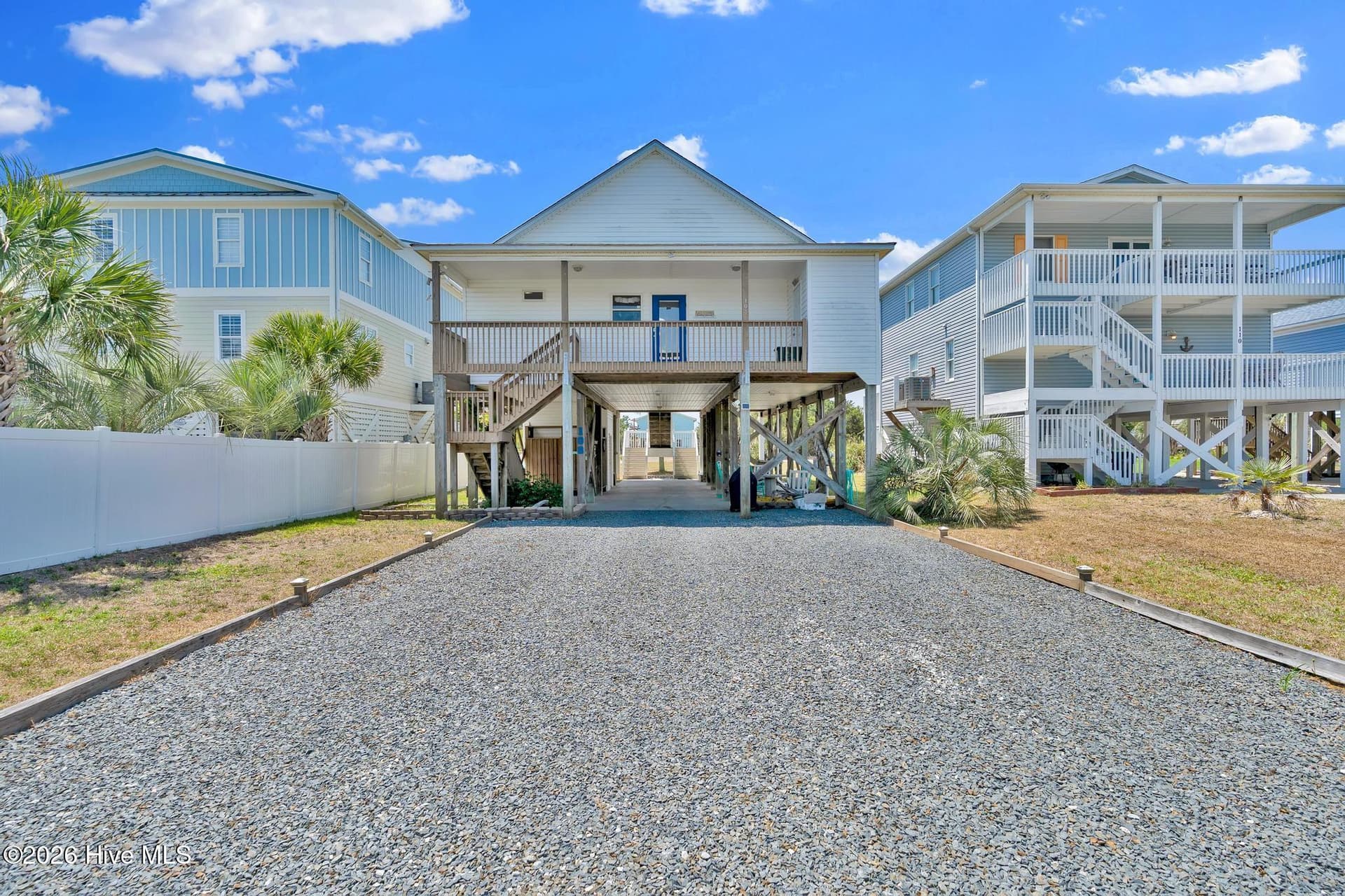 Back of home - 108 W Dolphin Drive, Oak Island, NC 28465