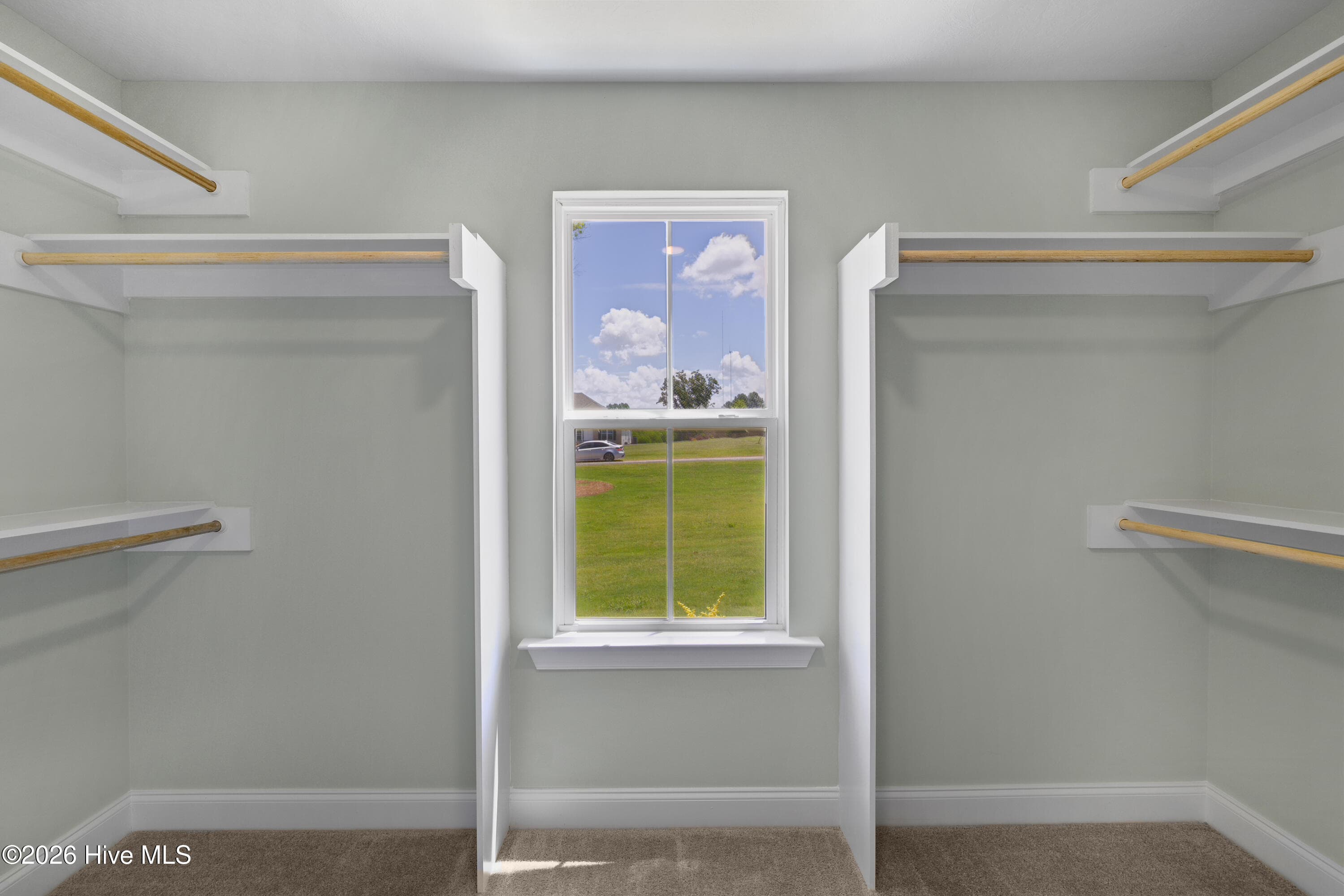 Primary closet has wood shelving - 1340 Bellingham Drive, Beech Island, SC 29842