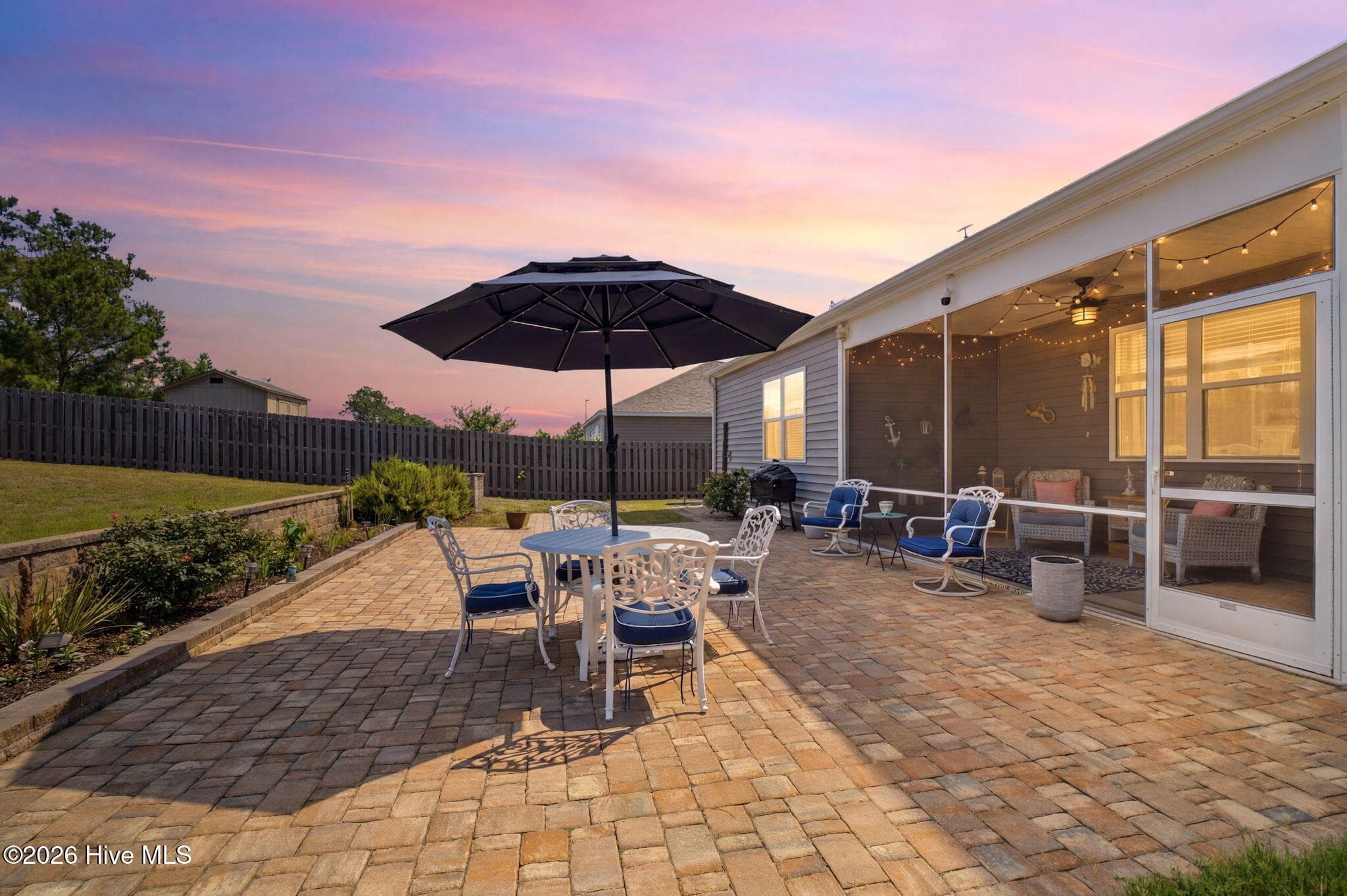 Back Patio - Pavers & Retaining Wall with Flower Bed - 1005 S Fisher King Drive SE Lot #291, Bolivia, NC 28422