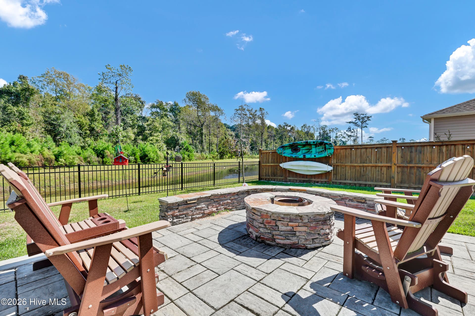 View of Stone Fire Pit & Seating - 512 Edgewater Way, Surf City, NC 28445