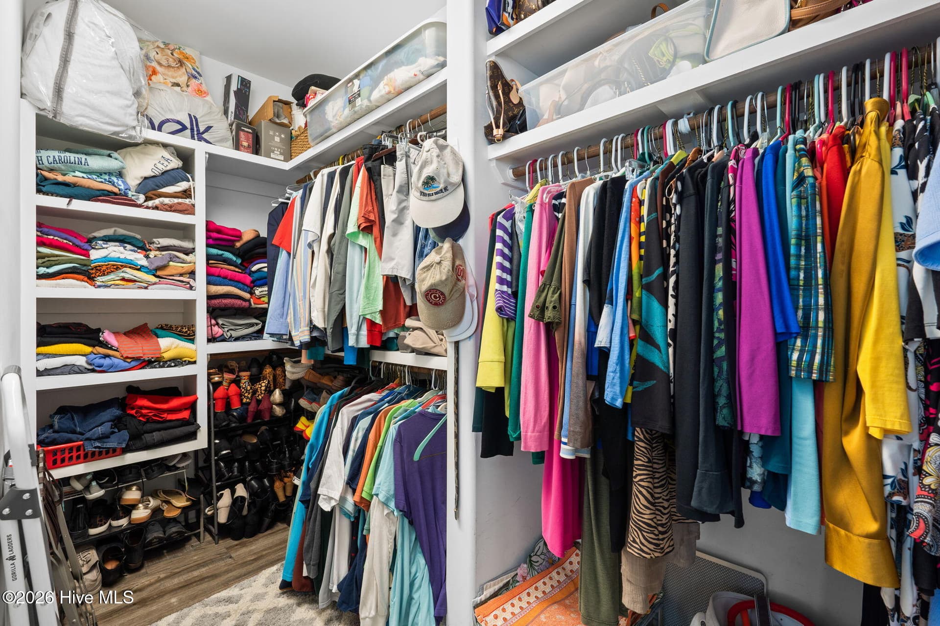 Primary Walk in Closet with wood shelving - 6363 Havencrest Drive SW, Ocean Isle Beach, NC 28469