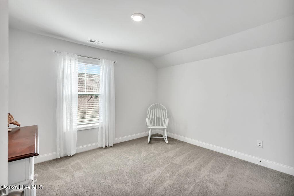 This second floor guest bedroom connects to a large and versatile Bonus room with nearby full bath. Together, the second floor space could make a terrific alternative living space, media, craft, play, exercise or study area. - 142 Rice Marsh Way, Wilmington, NC 28412