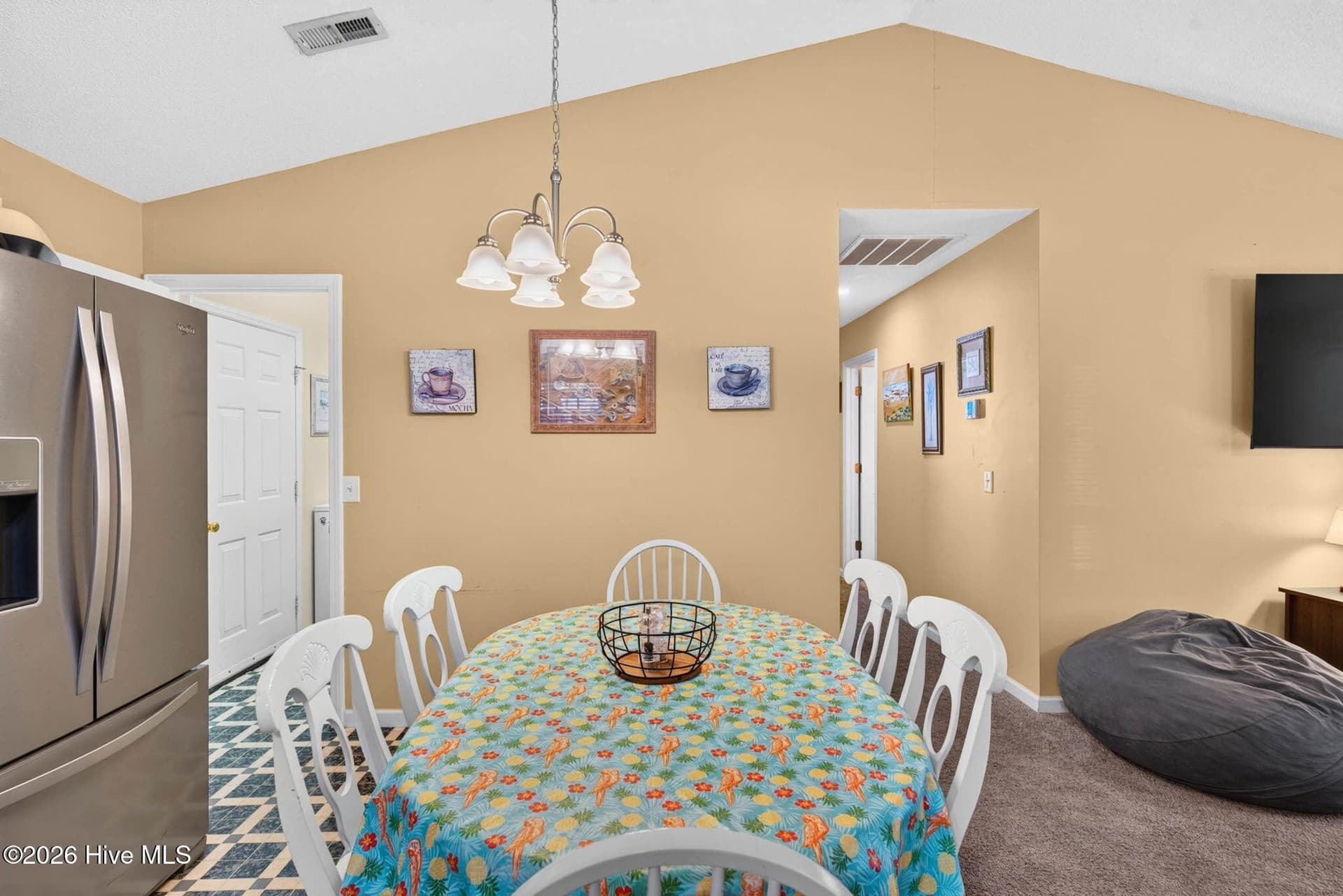 Dedicated dining space conveniently positioned between the kitchen and main living area. - 1650 Frink Street SW, Ocean Isle Beach, NC 28469