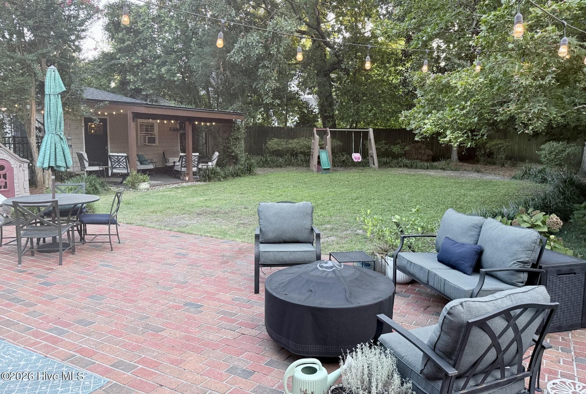 Backyard patio space - 318 Colonial Drive, Wilmington, NC 28403