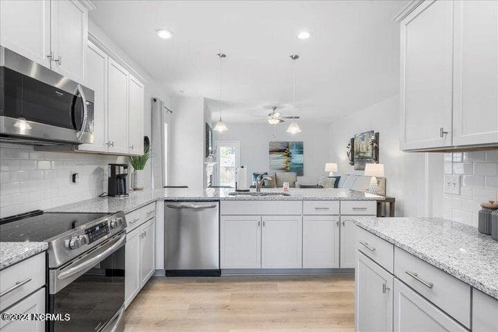 Photos of the same plan in a different community. - 100 Shoal Lane, New Bern, NC 28562