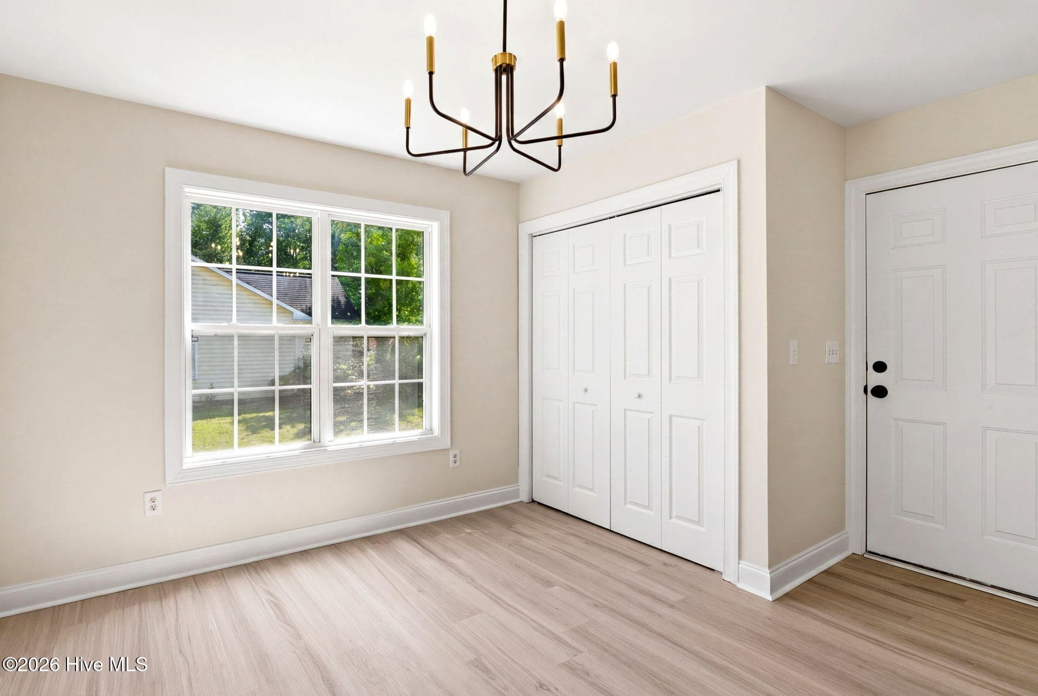 Dining Room looking towards the right side of the property line and the entrance to the garage - 215 Gardenview Court NE, Leland, NC 28451