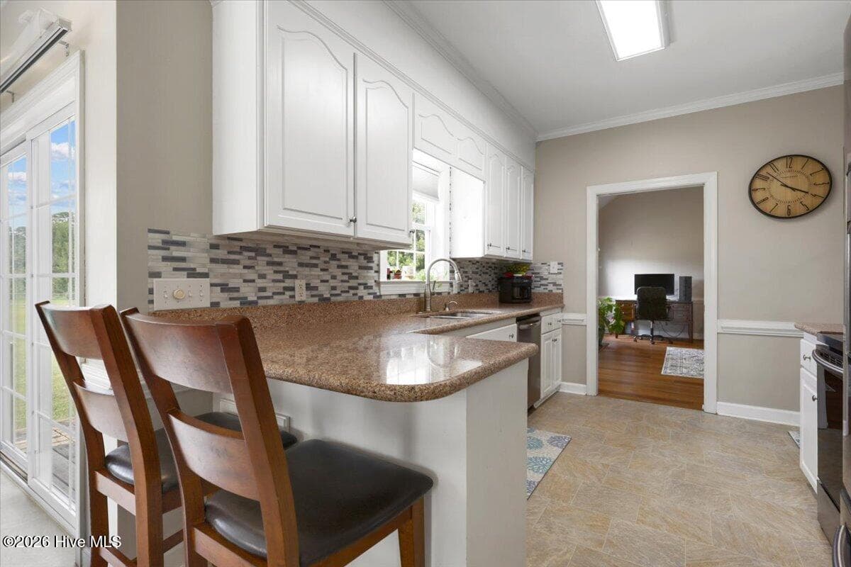 Bar area to kitchen window - 105 Pointe Drive, La Grange, NC 28551