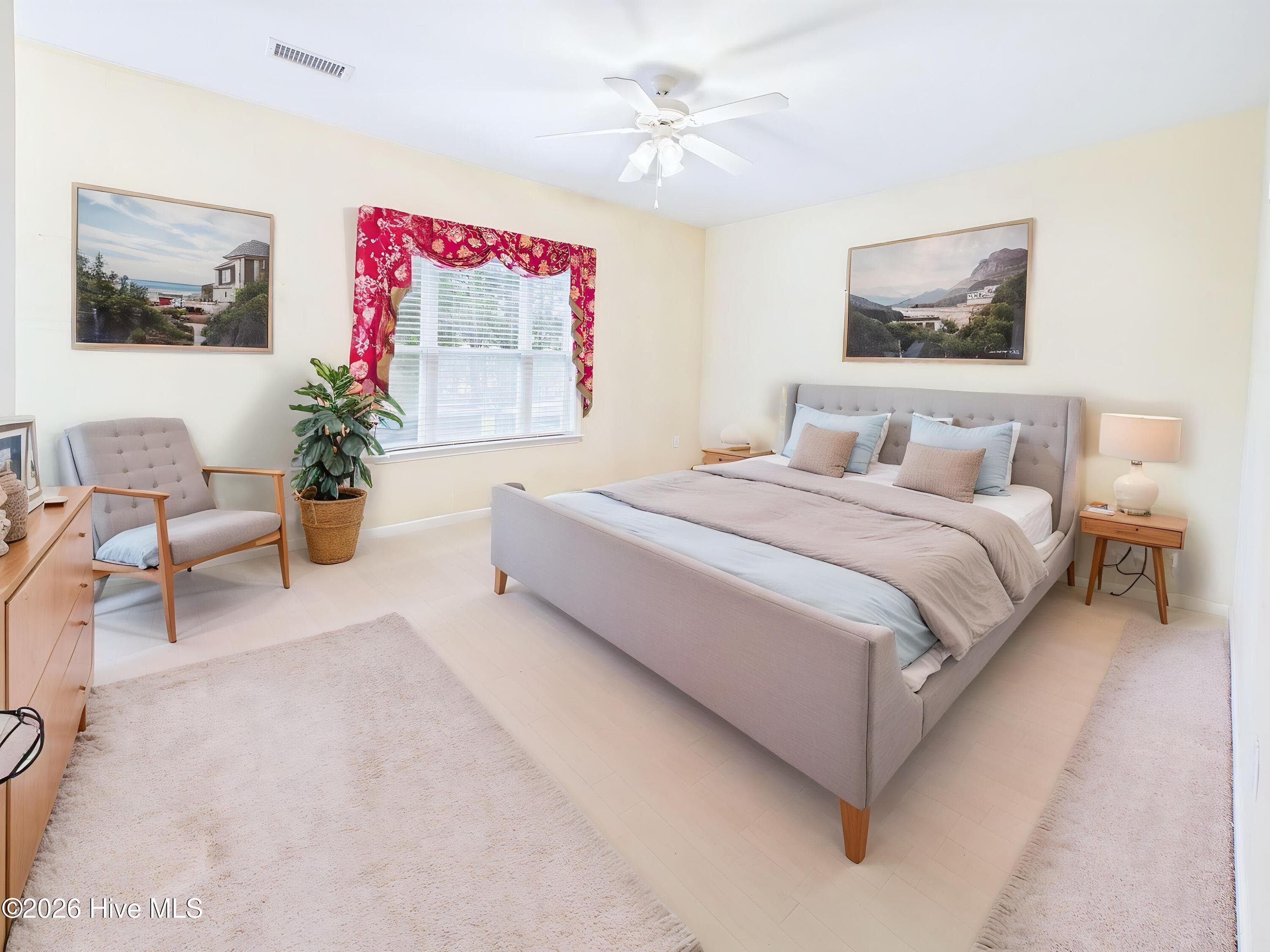 Virtually staged - primary bedroom - 3909 Botsford Court Unit 103, Wilmington, NC 28412