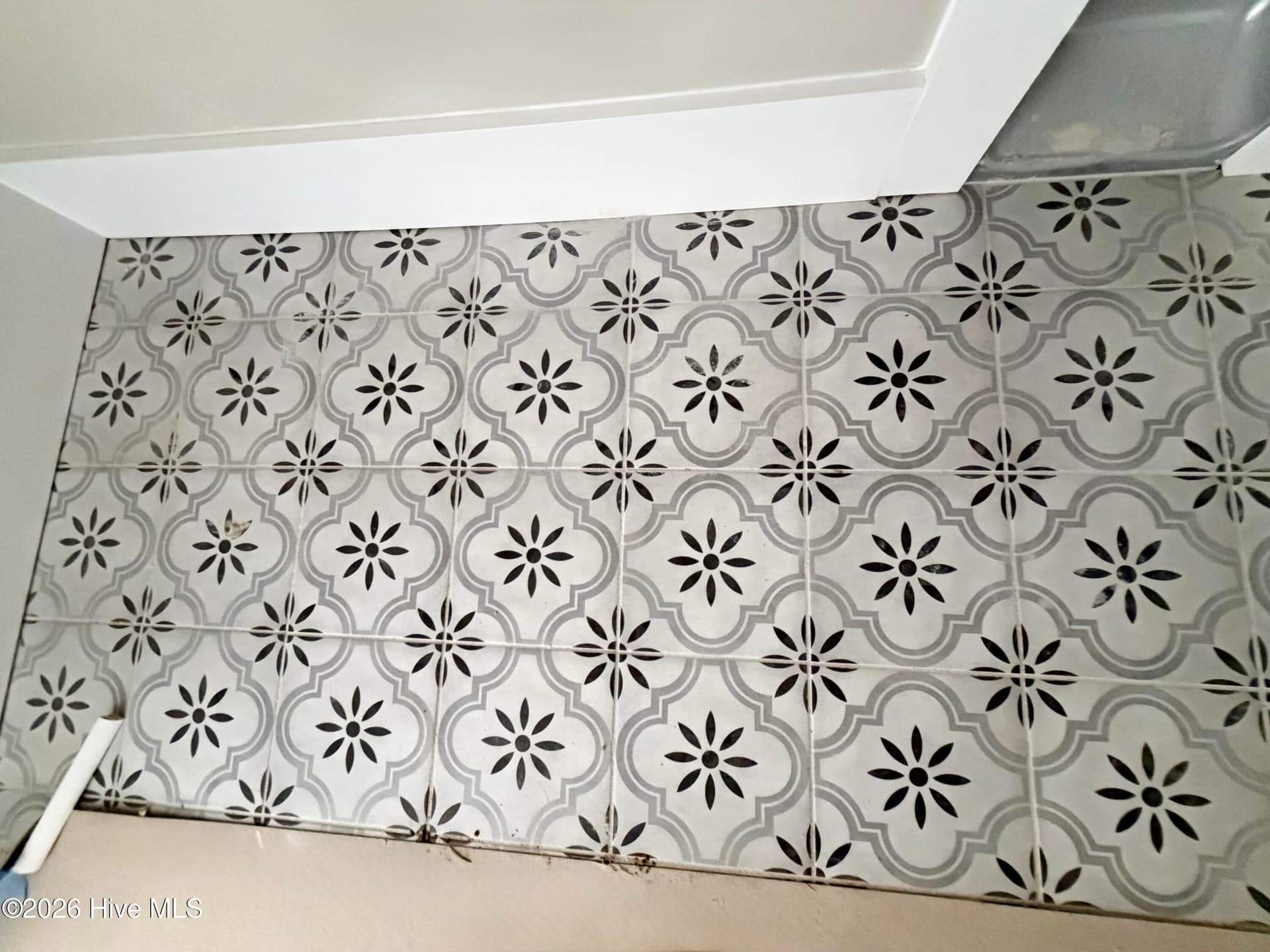 Custom tile in laundry/mud room. - 550 Glenburnie Street NW, Calabash, NC 28467