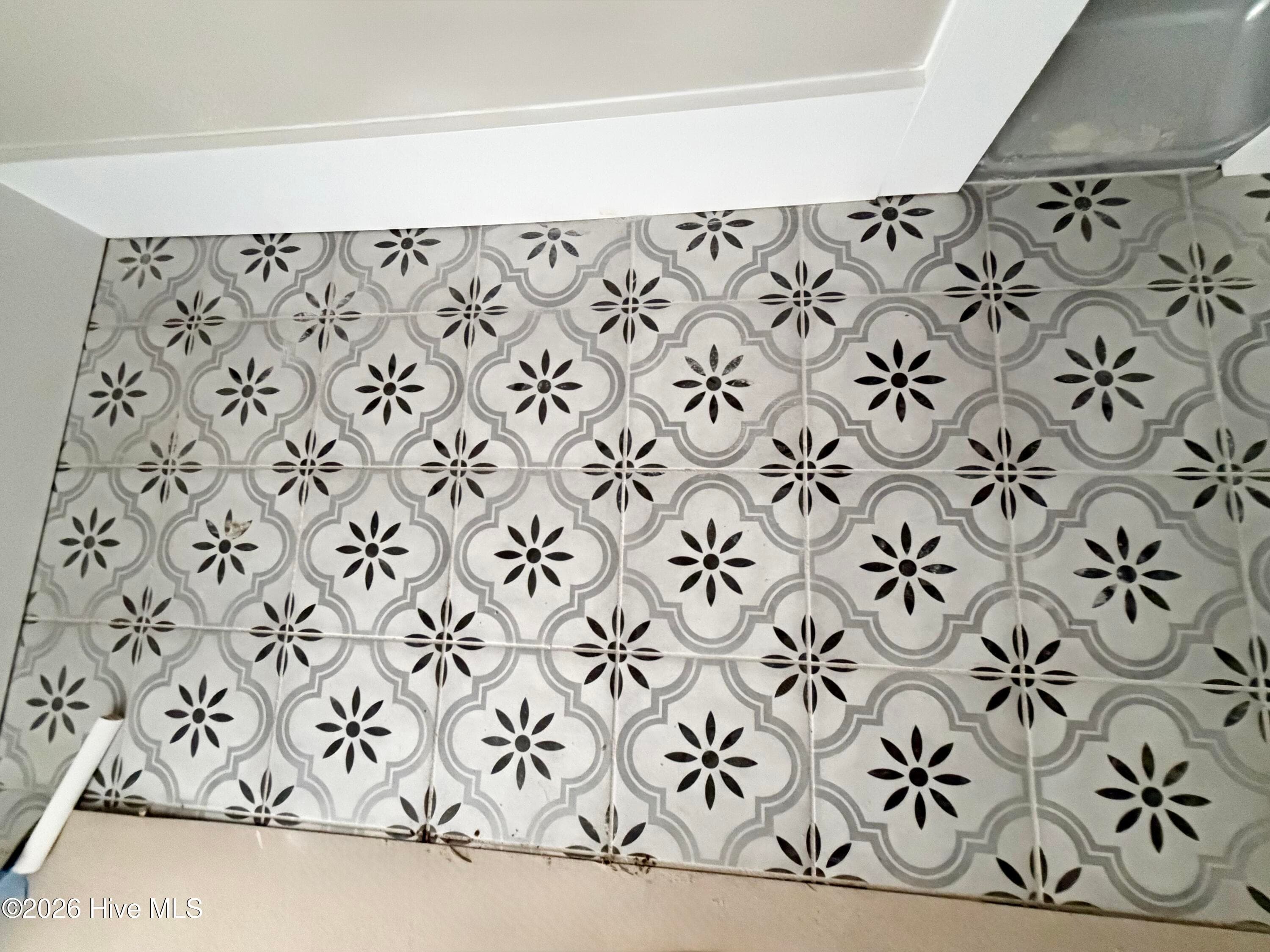 Custom tile in laundry/mud room. - 550 Glenburnie Street NW, Calabash, NC 28467