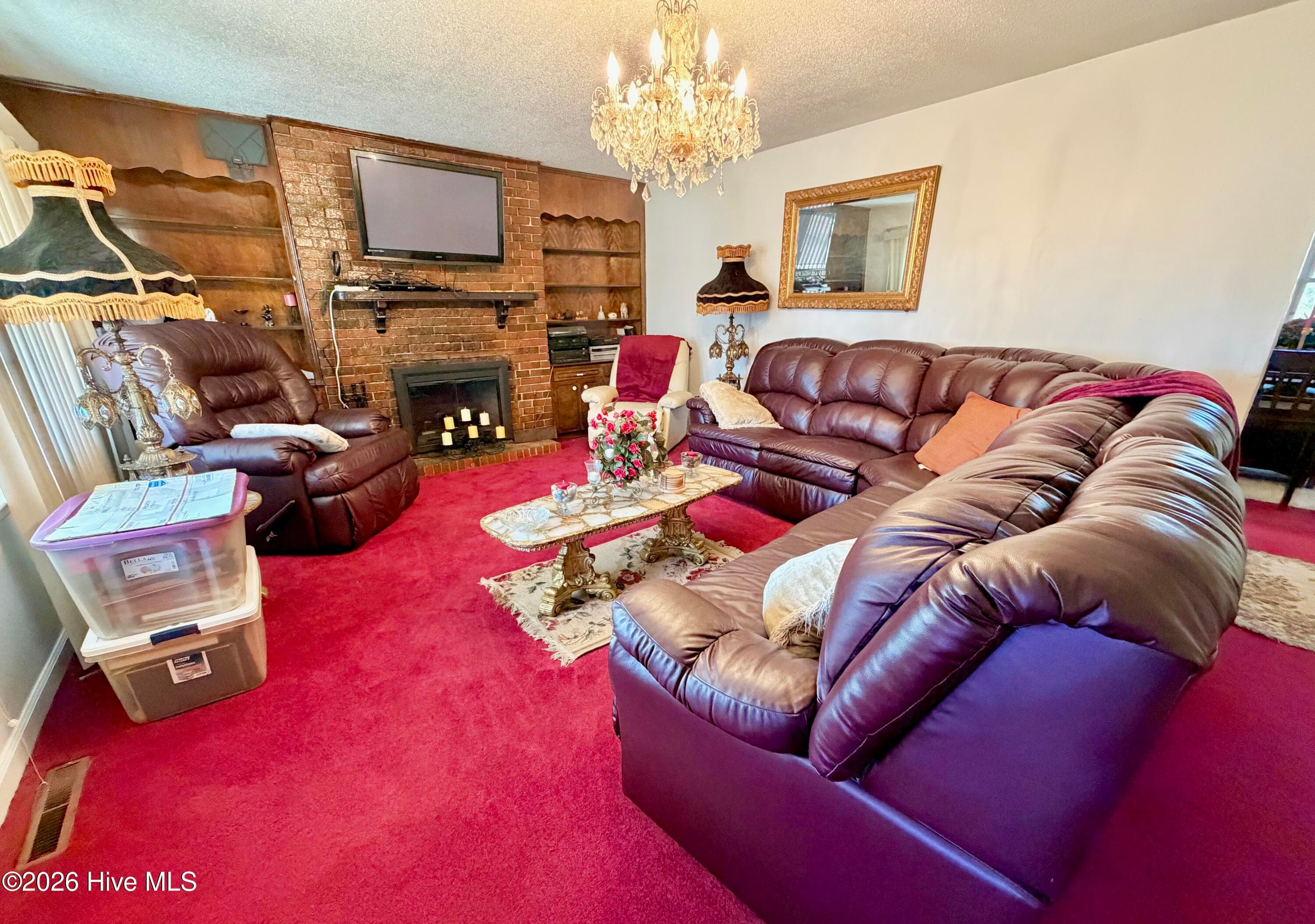 Living Room with built in cabinets and gas fireplace - 5978 Hwy 258 S, Deep Run, NC 28525