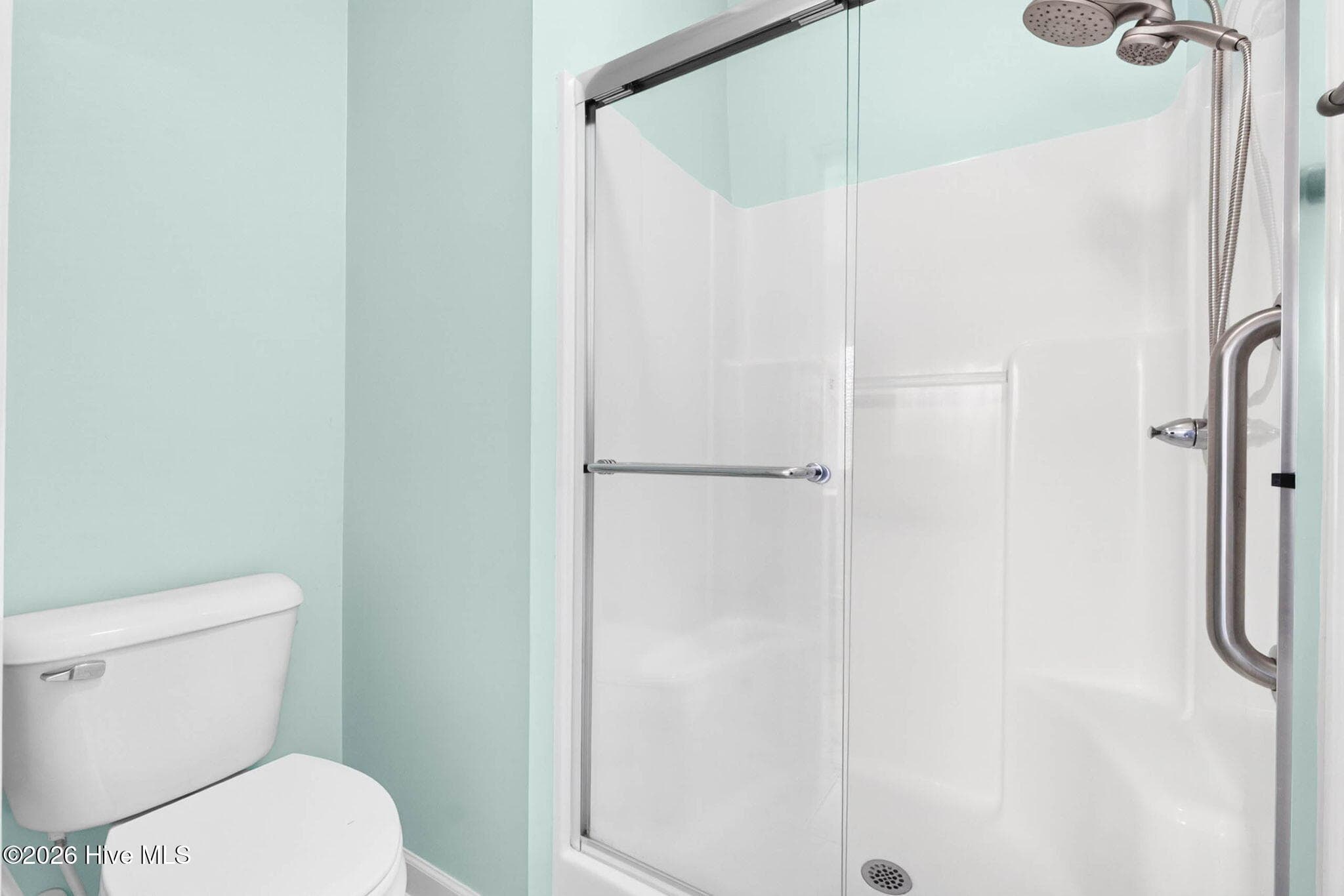 Primary bathroom with shower - 7825 High Market Street #303, Sunset Beach, NC 28468