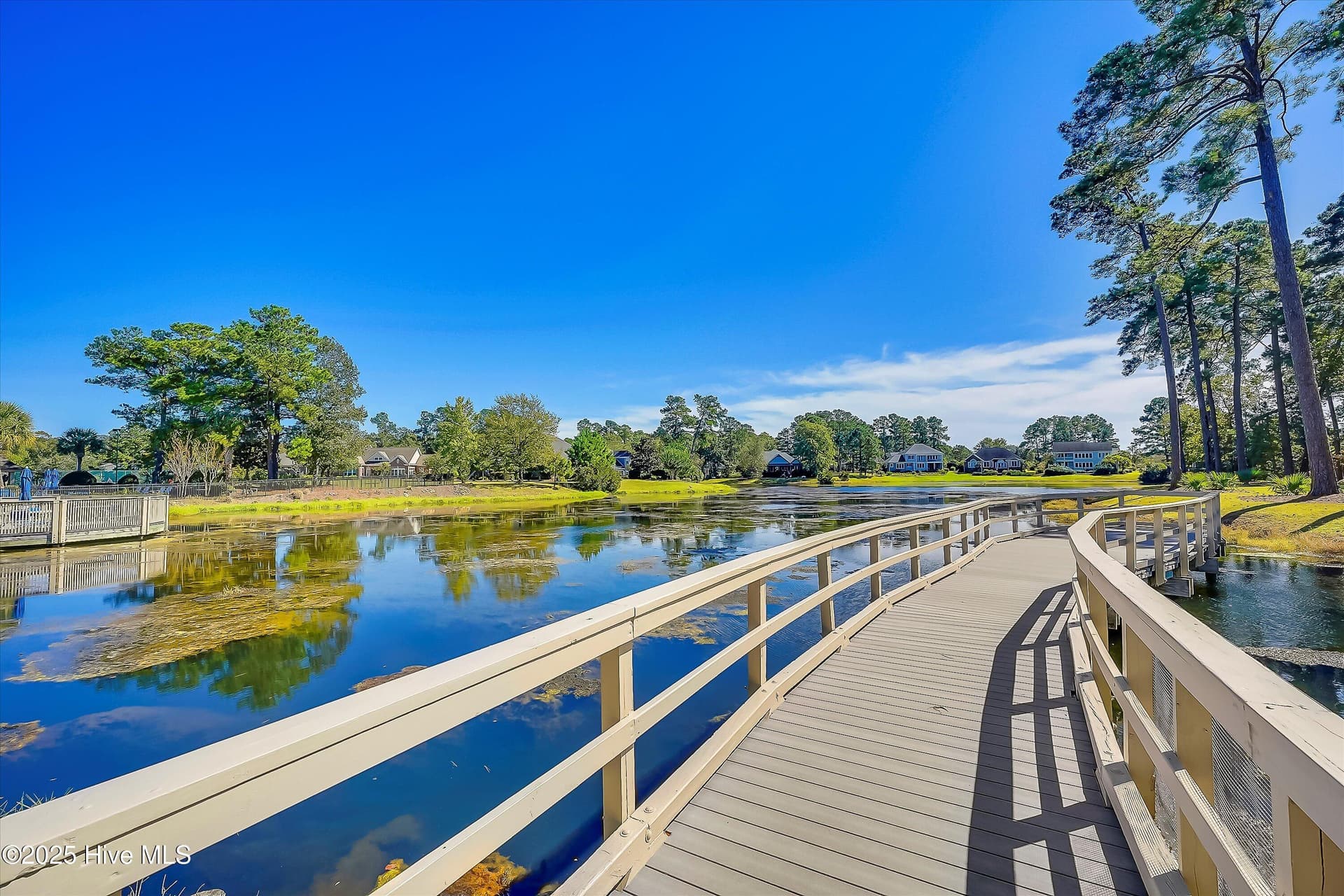 3.5 Acre Stocked Pond with Community Fishing Pier - 102 Reflection Court SW, Ocean Isle Beach, NC 28469