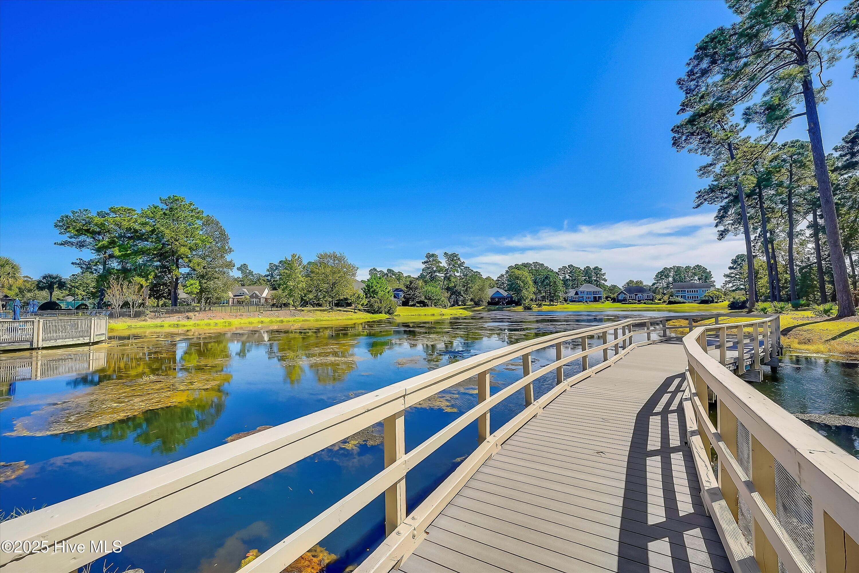 3.5 Acre Stocked Pond with Community Fishing Pier - 102 Reflection Court SW, Ocean Isle Beach, NC 28469