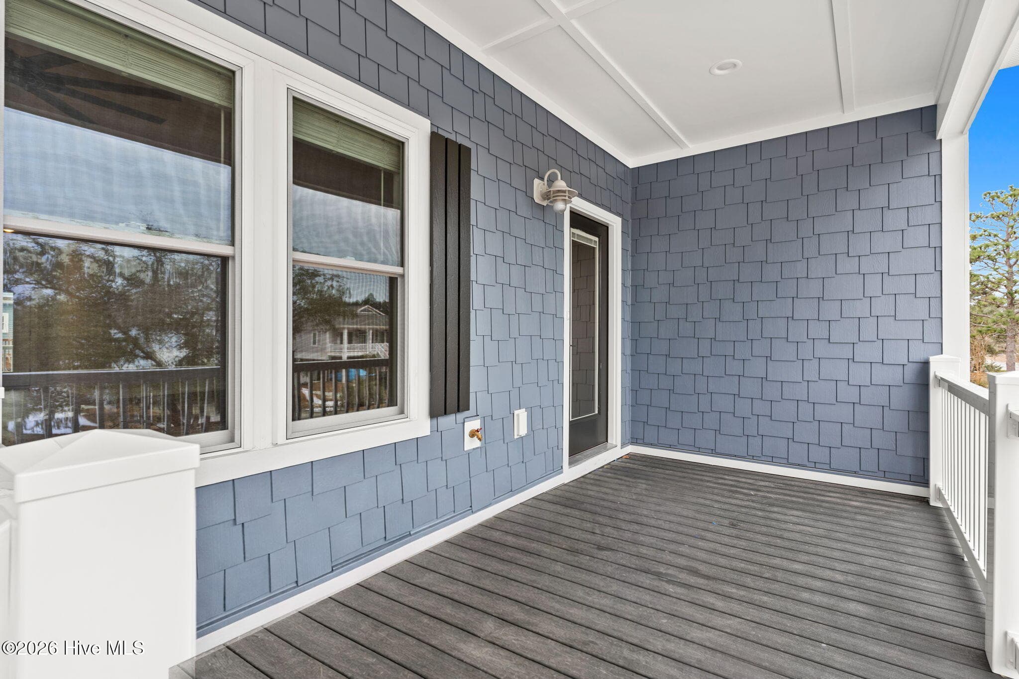 Photo is for illustrative purposes only of a similar home of same plan - 310 NE 58th Street, Oak Island, NC 28465