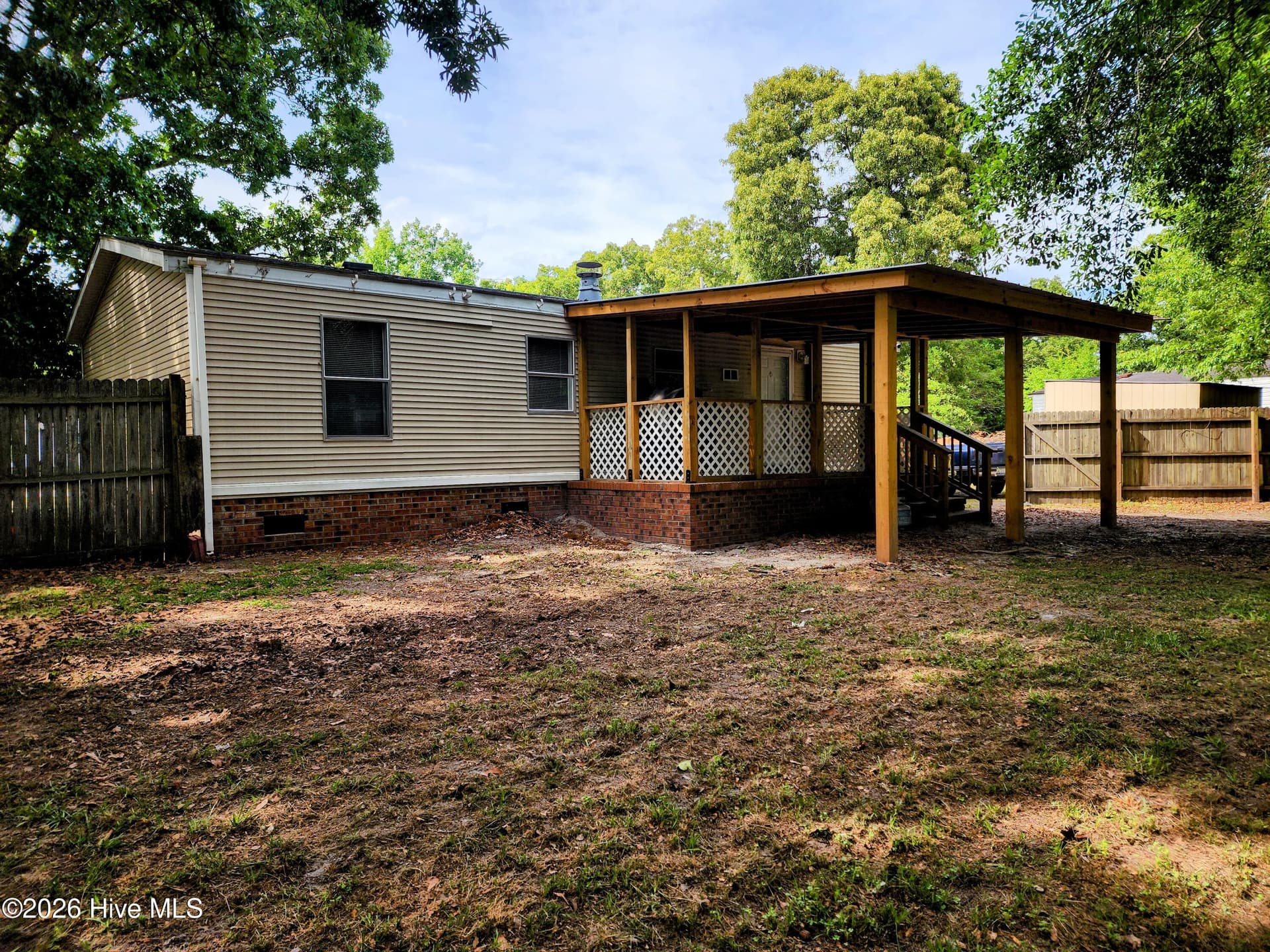 Manufactured Home at 623 Sandy Bluff Drive SW, Supply, NC 28462, photo 19 of 26