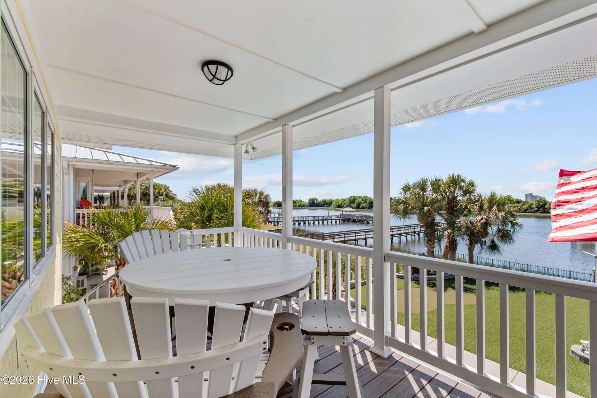 Back porch sitting area. - 2024 Camelot Drive SW, Ocean Isle Beach, NC 28469