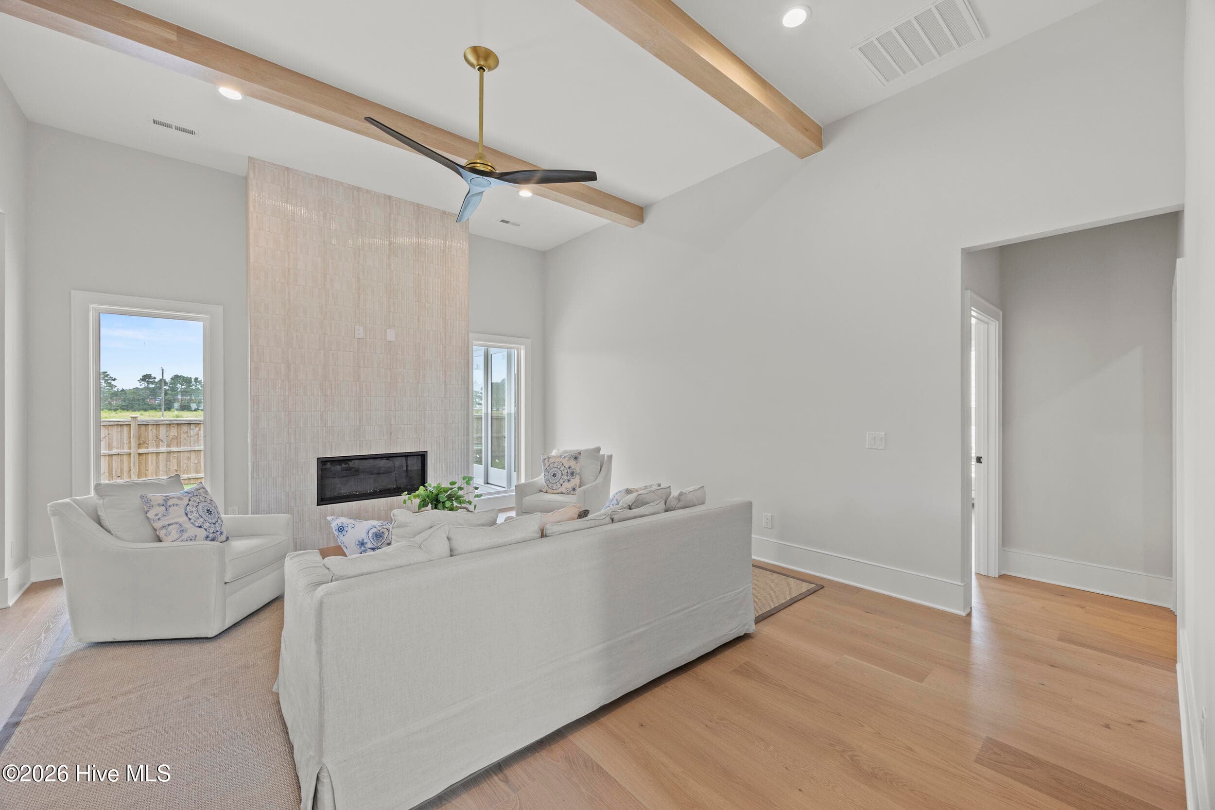 Living room with custom beams - 117 Grand Harvest Court, Wilmington, NC 28411