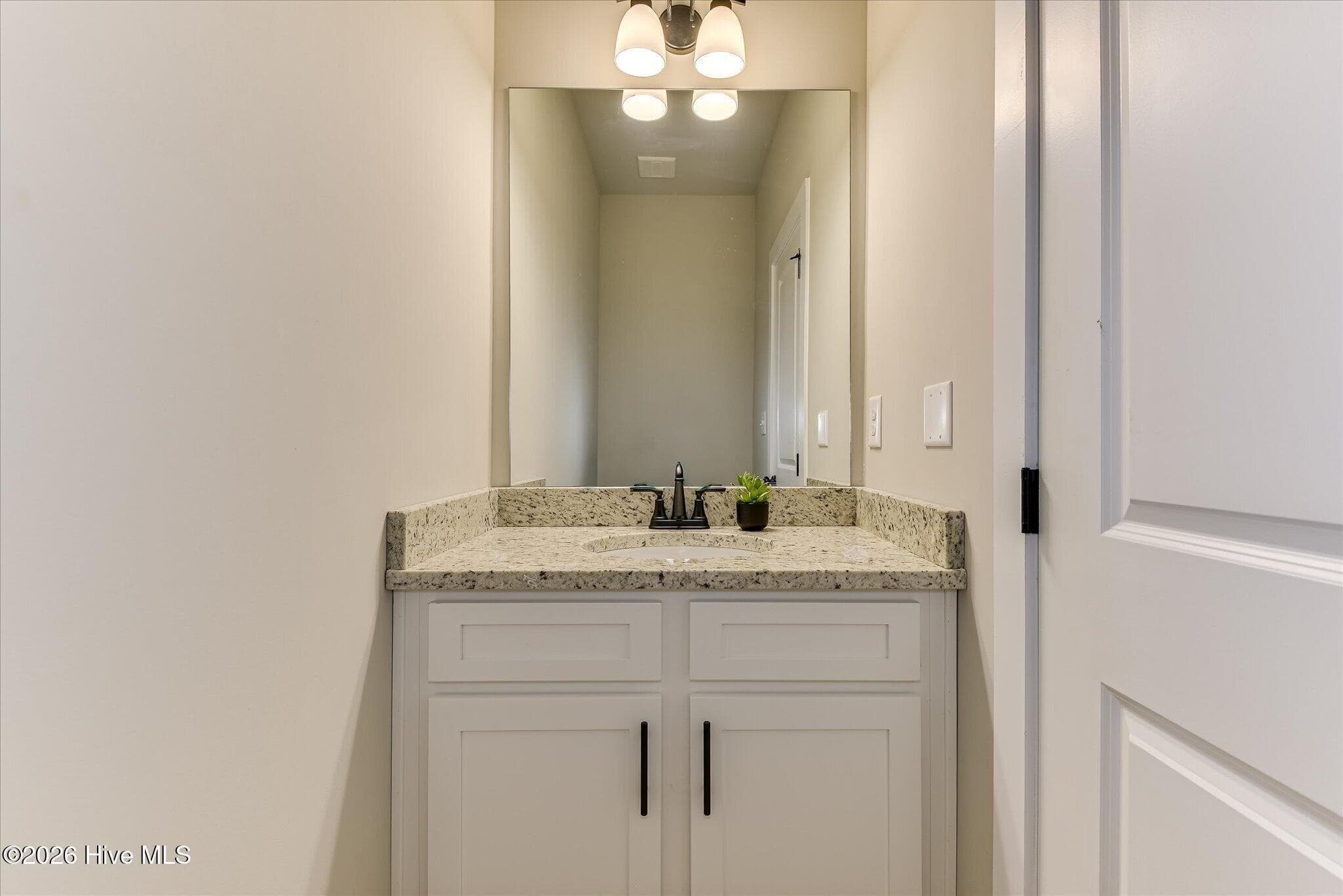 Half bathroom for guests - 1198 Sunset Cove, Tignall, GA 30668