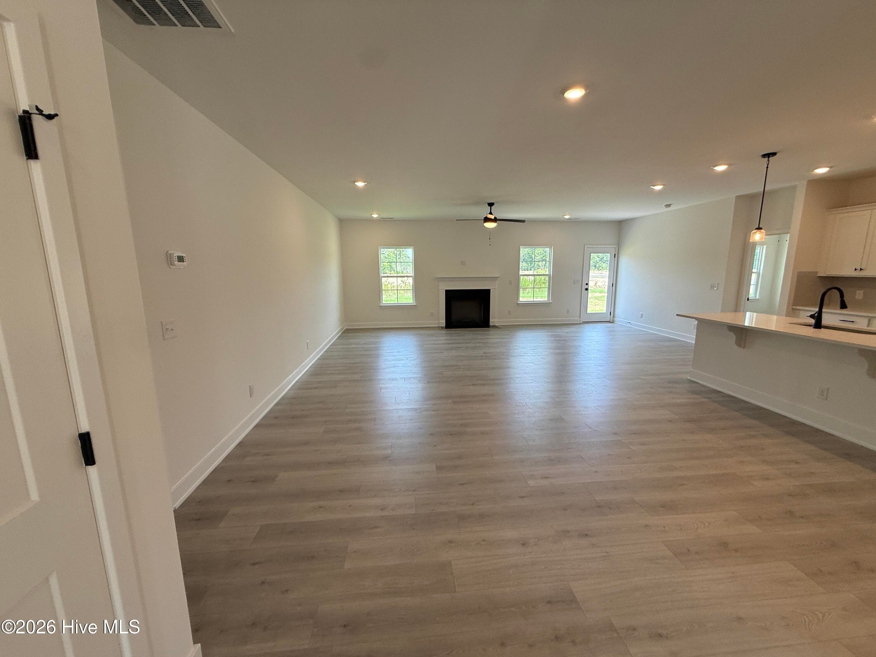 Representative photo Family Room and kitchen - 2129 Sandbrook Loop, Leland, NC 28451