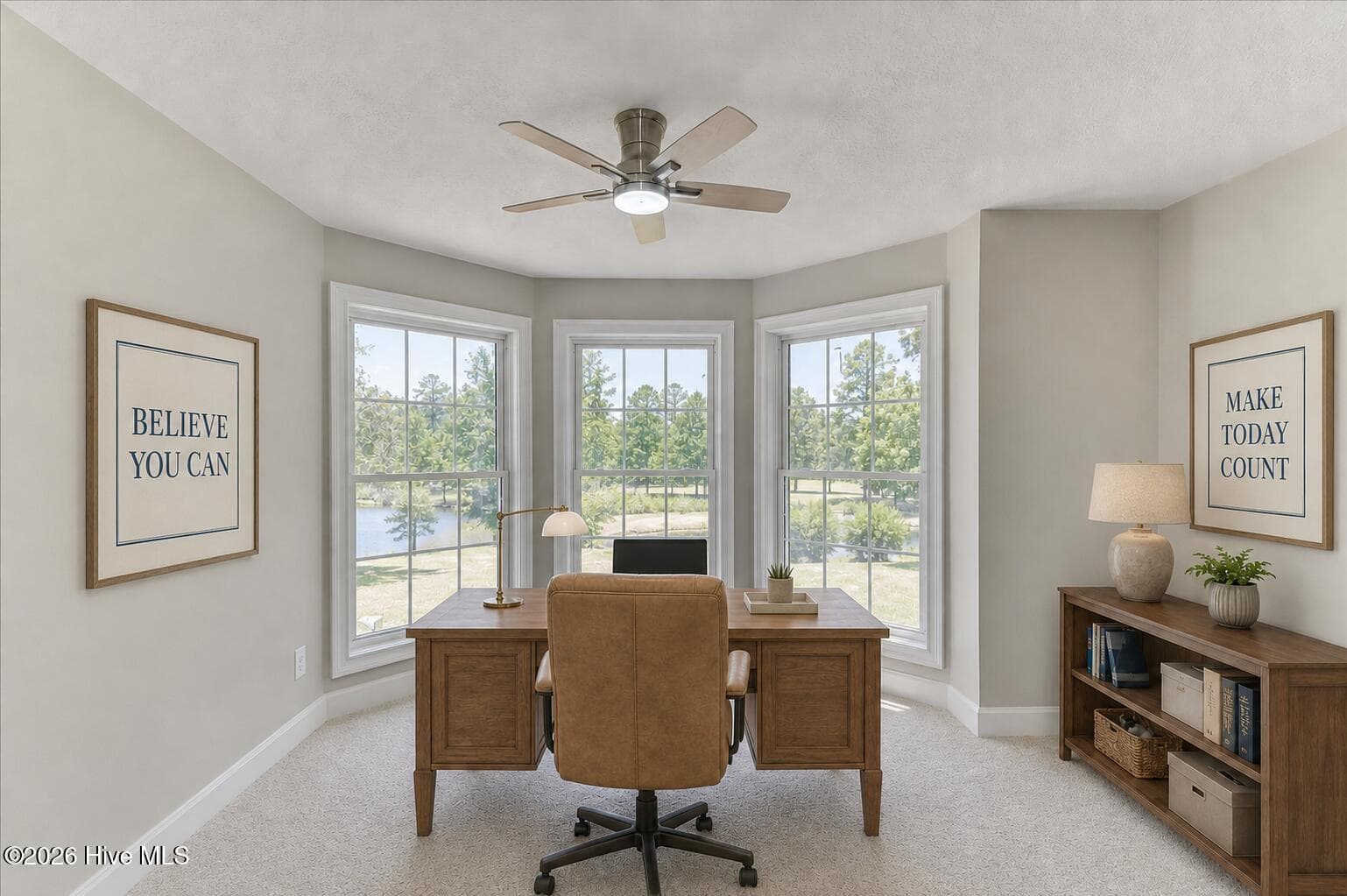 Virtually staged as a home office. Furniture and décor are digitally added and are not included with the property. Facing the Pond. Can you see it? - 1154 Water Oak Drive, Lincolnton, GA 30817