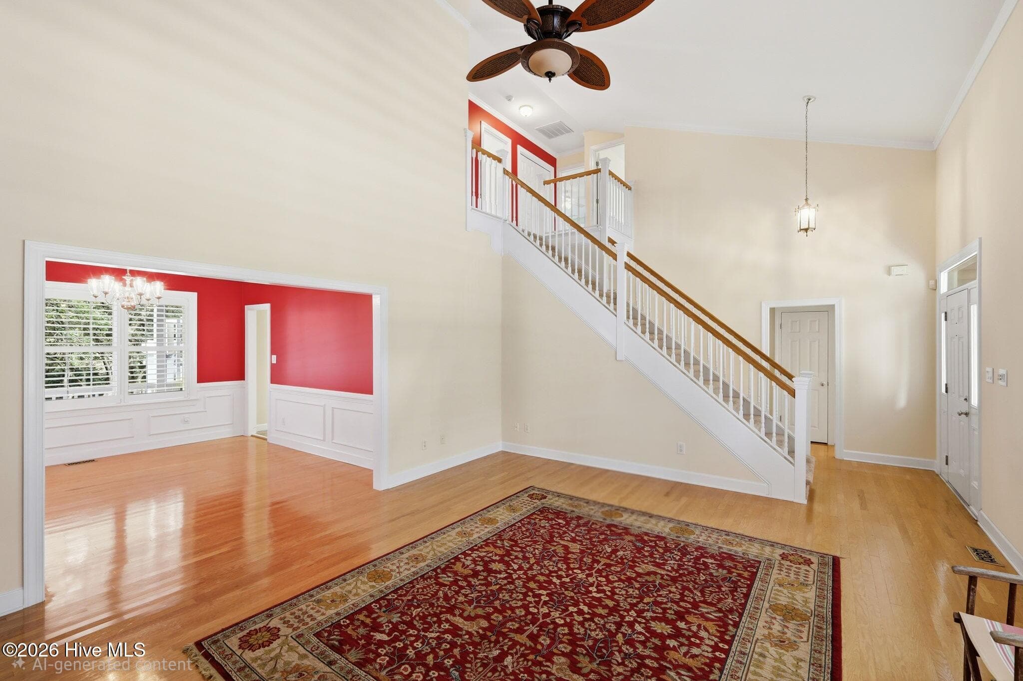 Living room and dining area (before painting upstairs and in dining room) - 104 Talford Drive, Atlantic Beach, NC 28512