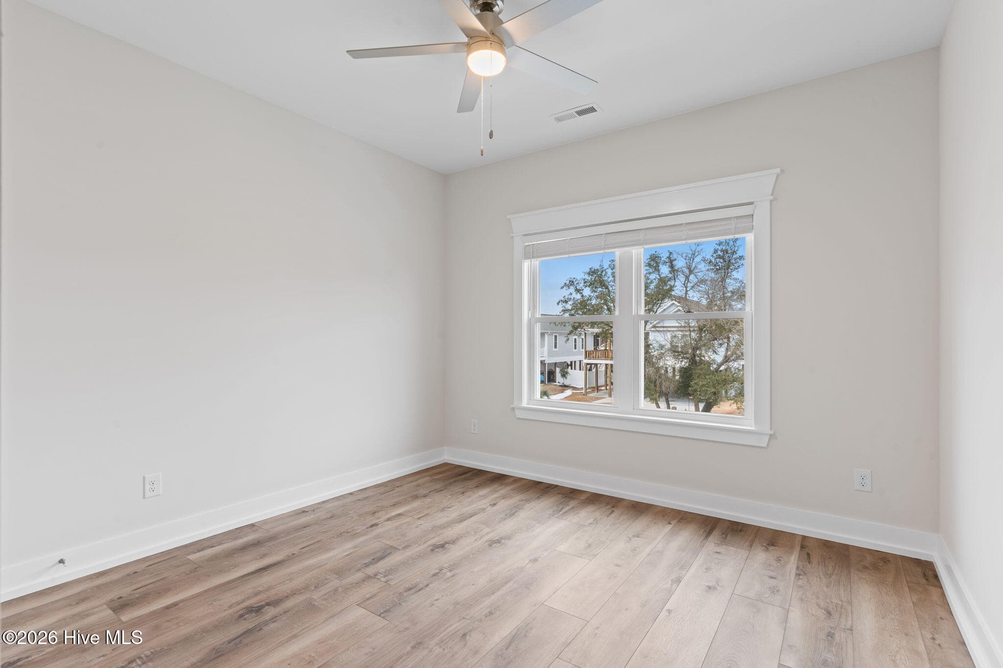 Photo is for illustrative purposes only of a similar home of same plan - 310 NE 58th Street, Oak Island, NC 28465