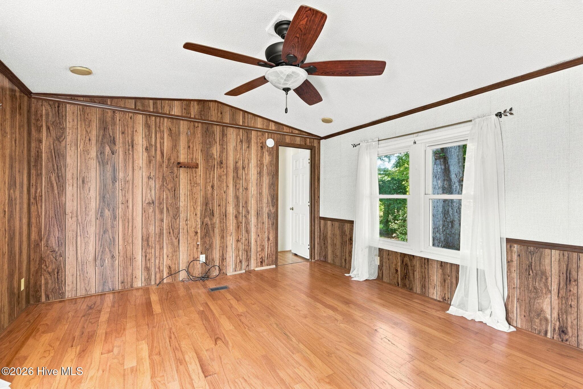 Living room to primary - 114 Lejeune Road, Cape Carteret, NC 28584