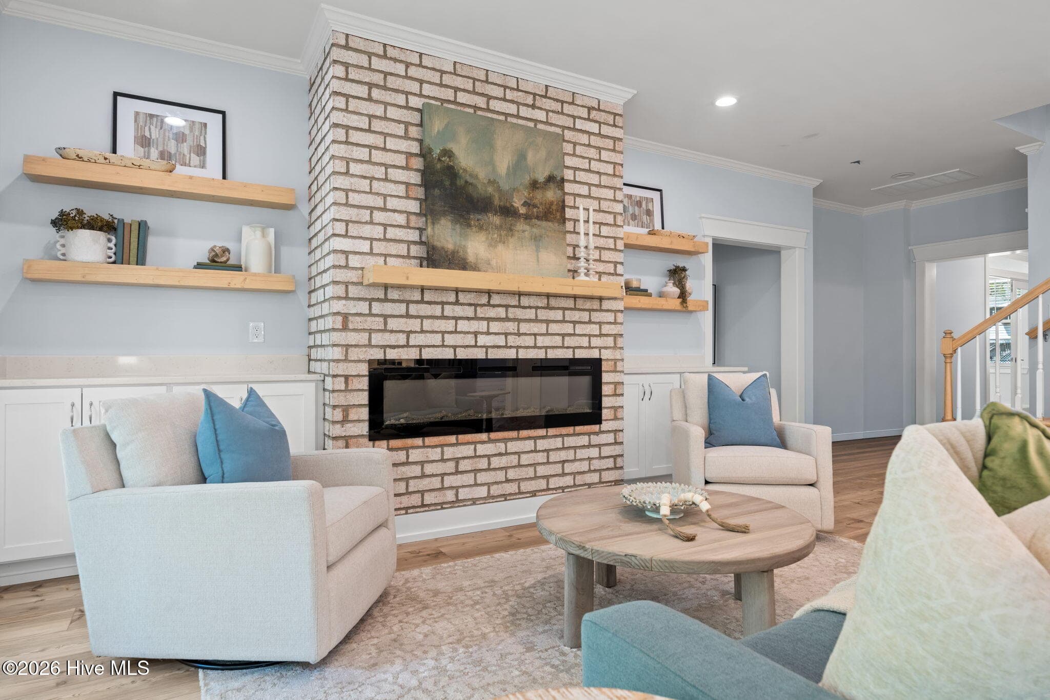 Photos of a staged model of the exact same plan - 312 NE 58th Street, Oak Island, NC 28465