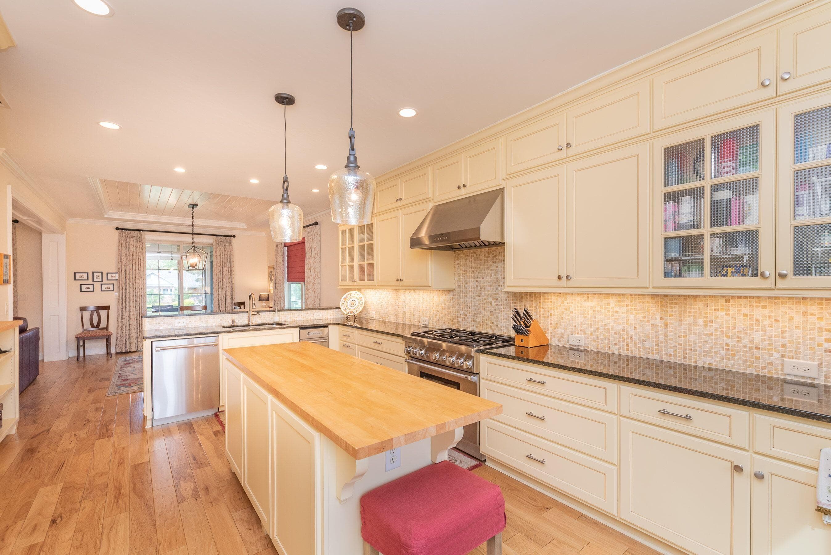 Kitchen island with butcher block countertop - 207 Quiet Oak Court, Aiken, SC 29803