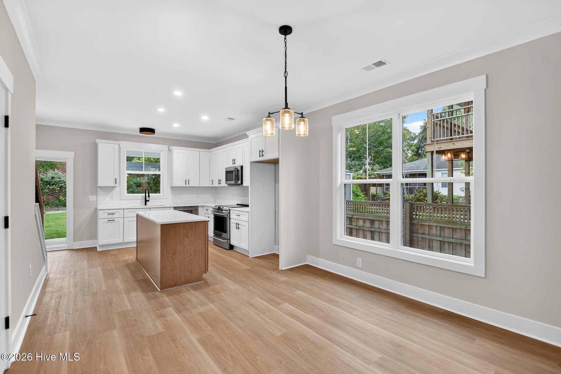 Dining Room looking towards the Kitchen and Rear Slider - 2303 Chestnut Street, Wilmington, NC 28405