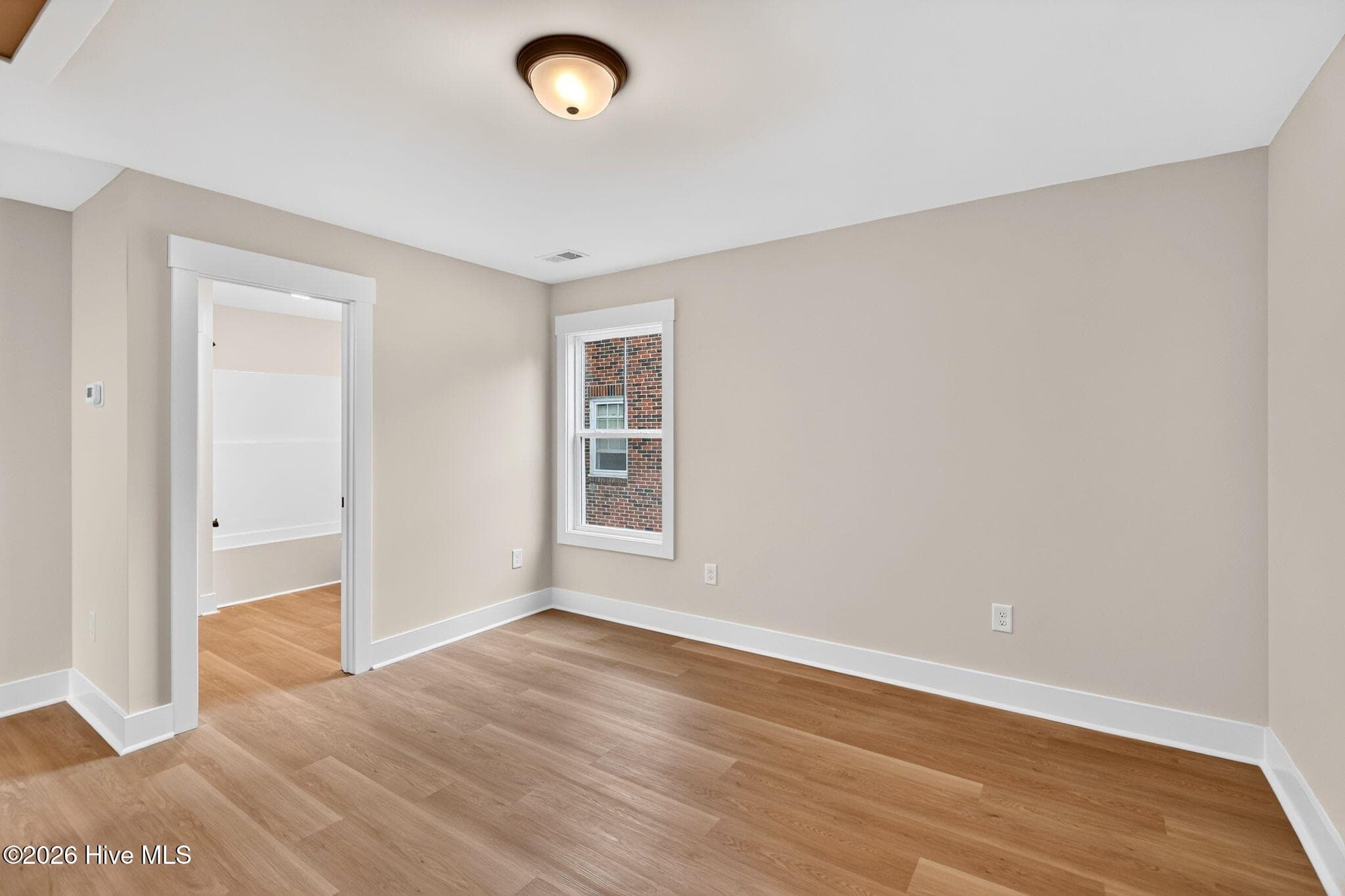 Upstairs Family Room looking towards the full bathroom - 2303 Chestnut Street, Wilmington, NC 28405