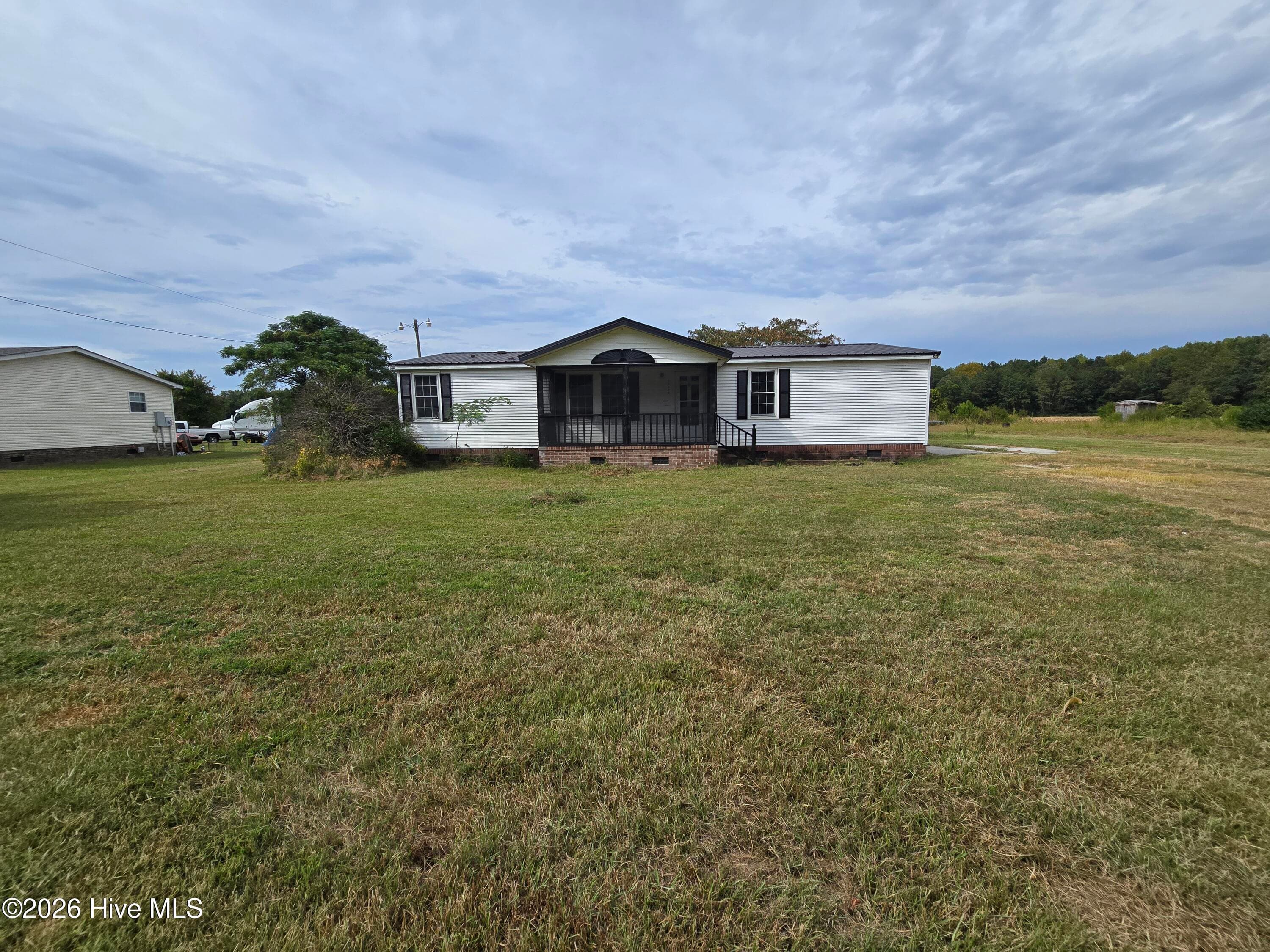 Manufactured Home at 12067 Nc Hwy 32 N, Roper, NC 27970, photo 2 of 2