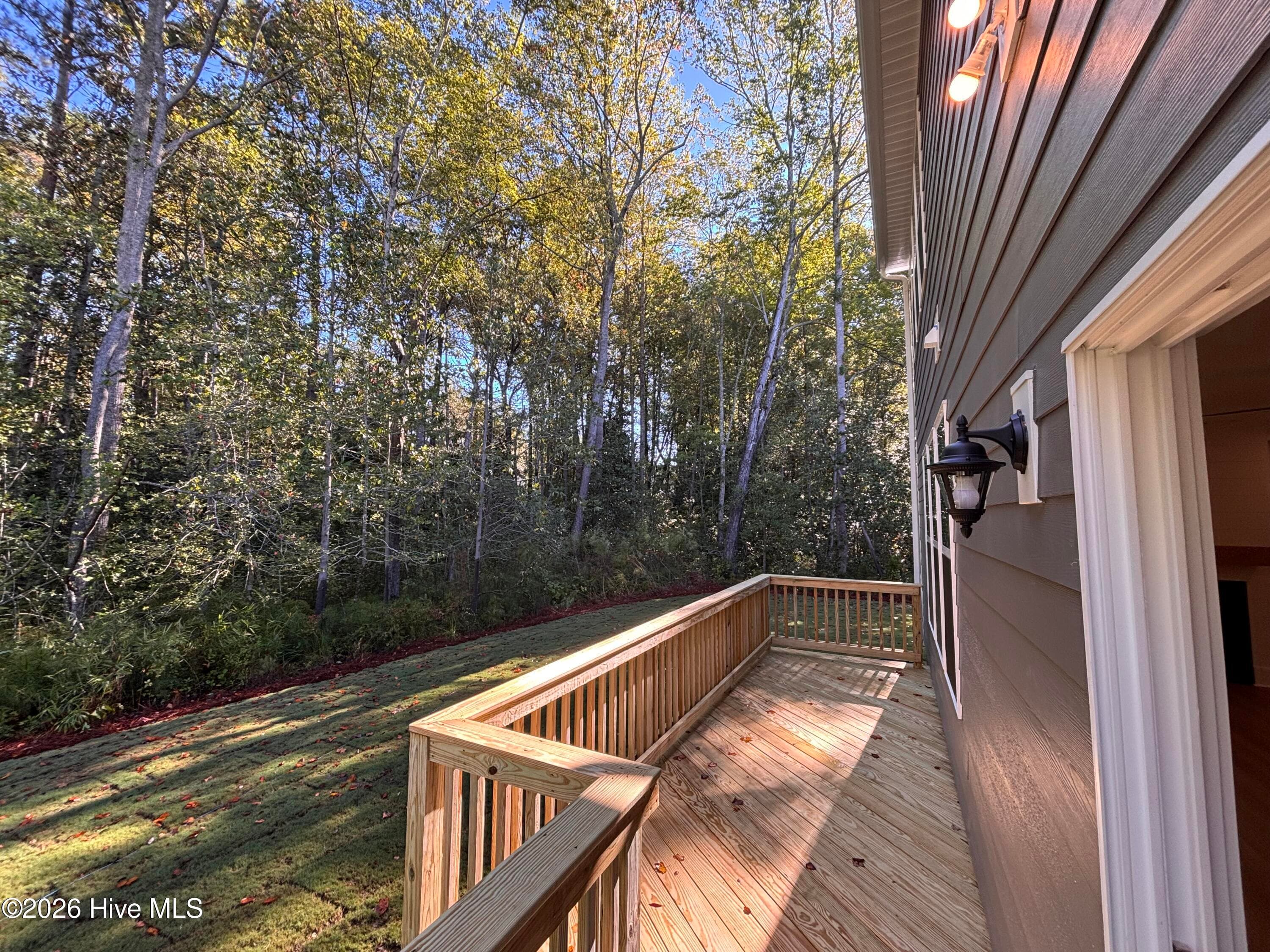 Deck overlooking wooded and private backyard! - 370 Glade Drive, Aberdeen, NC 28315