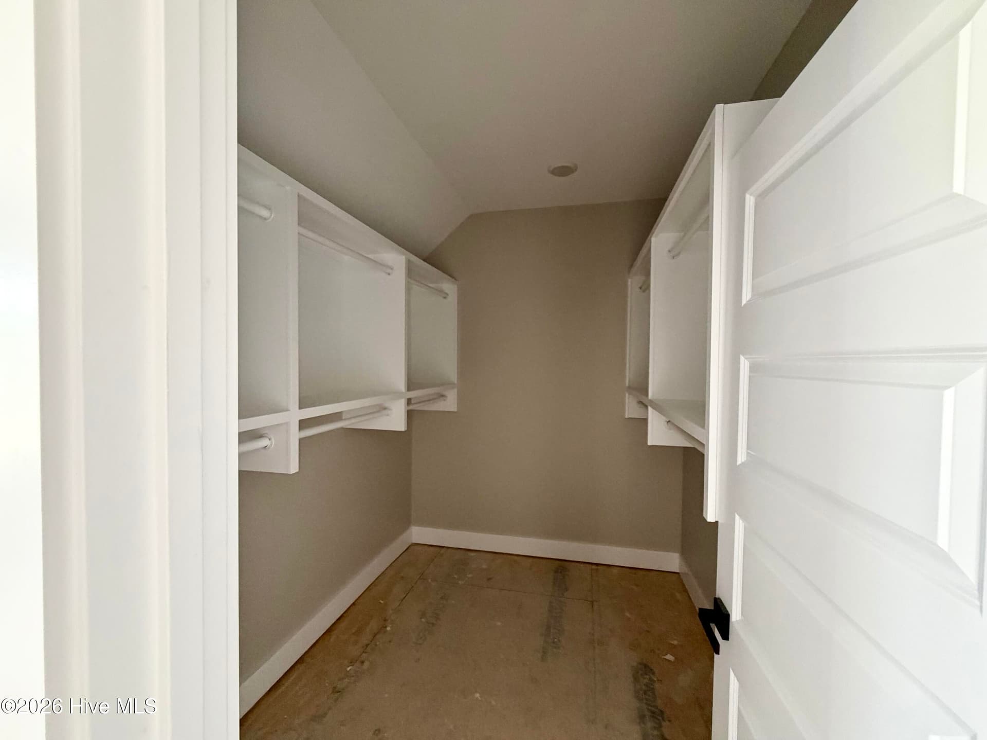 Guest bedroom 3 walk in closet, under construction. - 550 Glenburnie Street NW, Calabash, NC 28467