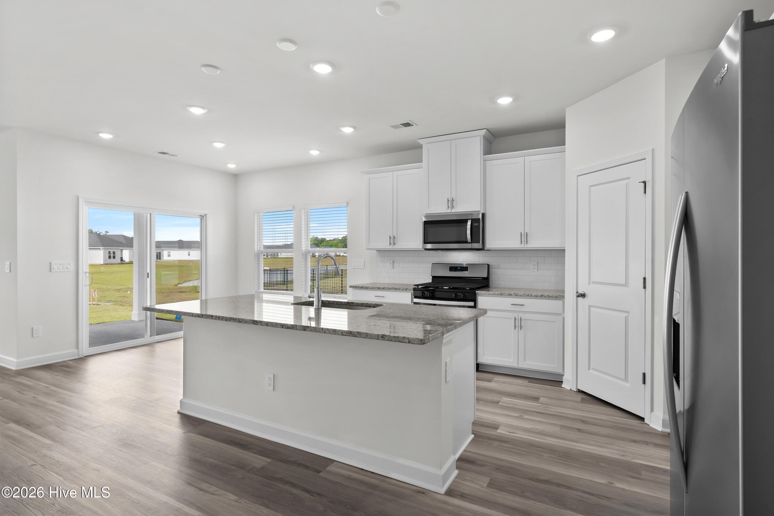 Photo is not of the actual home, but is an example photo of a completed home and may depict options and/or features that are not included - 4154 Generations Circle NW, Ash, NC 28420