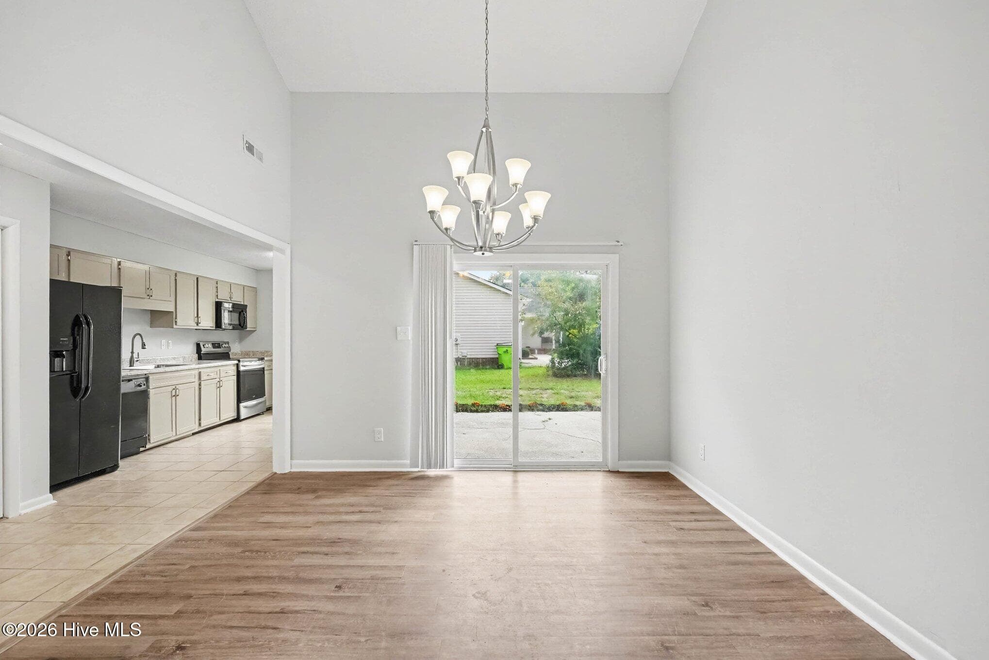 Sized to accommodate a variety of dining sets and styles, this space opens seamlessly into the adjoining kitchen. - 108 Deerfield Drive, Spring Lake, NC 28390