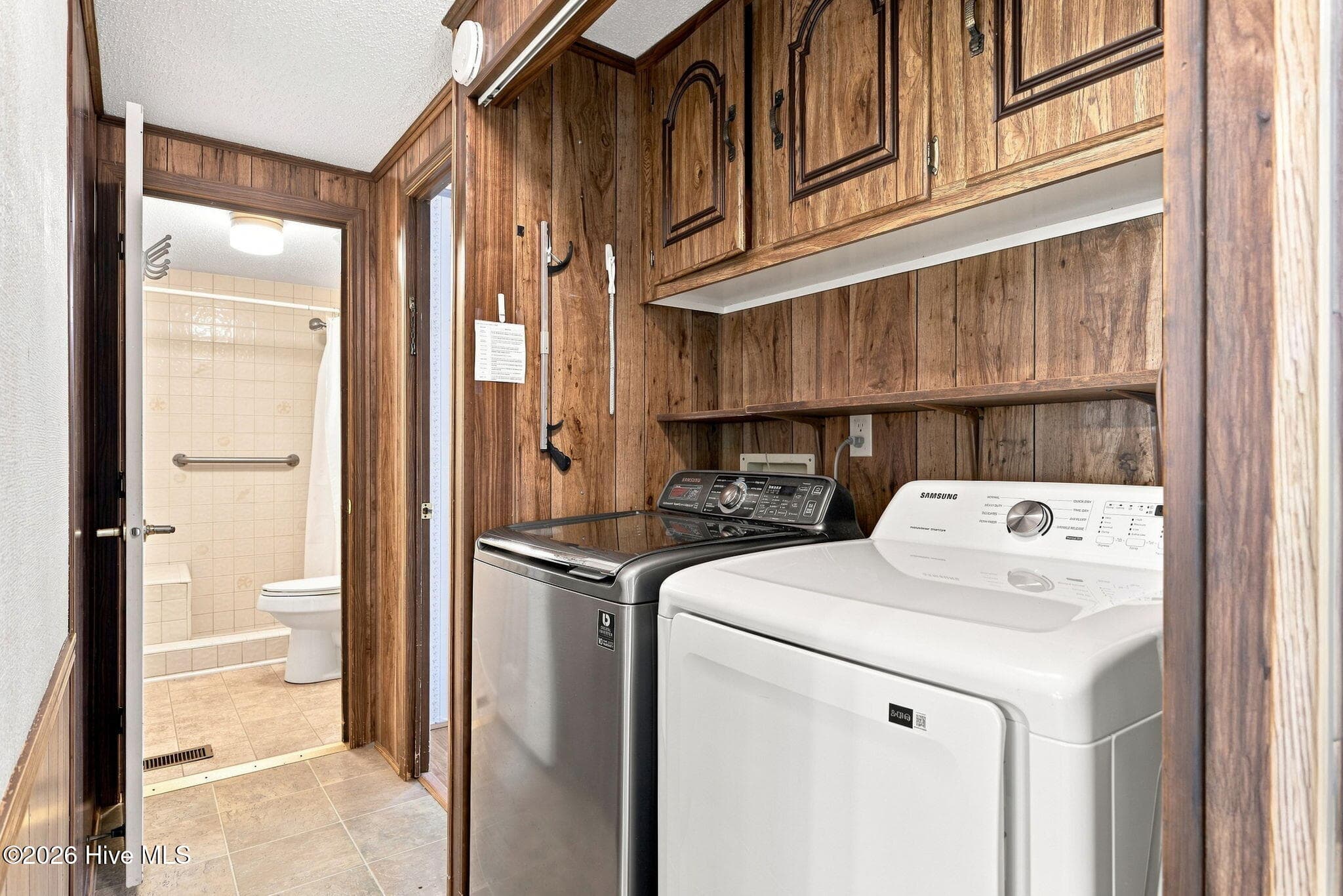 Laundry in hallway - 114 Lejeune Road, Cape Carteret, NC 28584