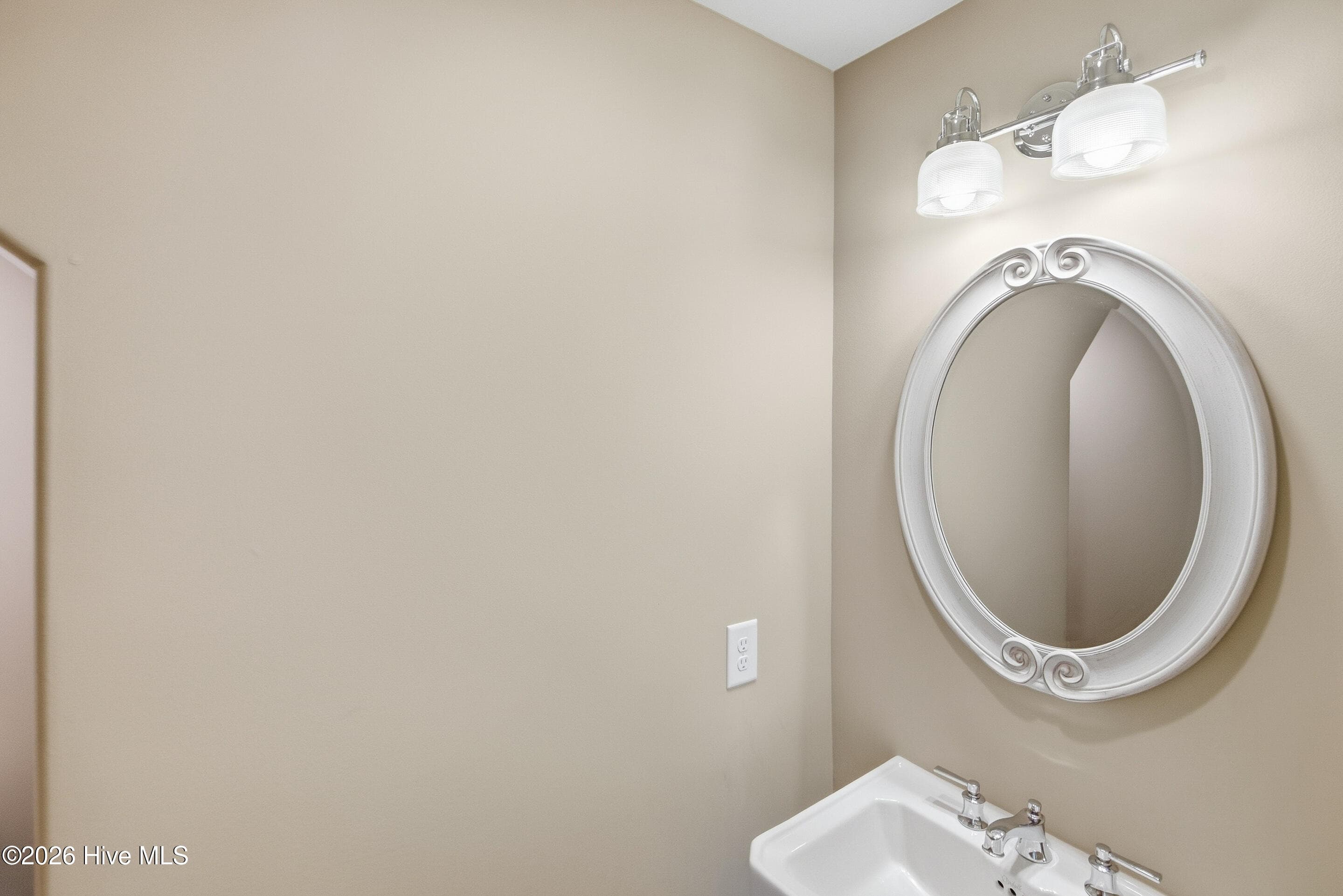 Powder room convenient to kitchen and guest bedrooms - 2153 Forest View Circle, Leland, NC 28451