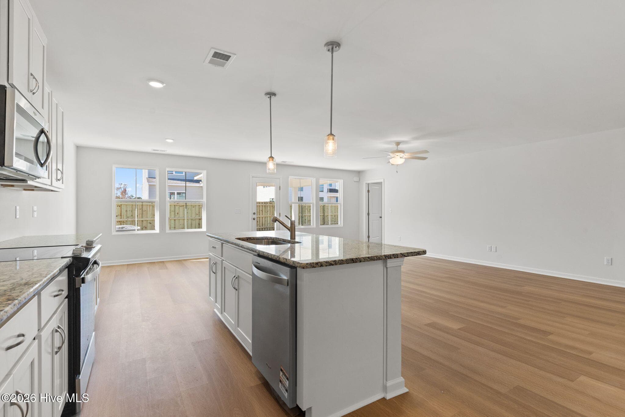 Home shown is a representation of the floor plan and may include optional features or upgrades. Elevations, materials, colors, finishes, square footage, and included features may vary from the actual home. Please consult a Sales Representative for complete details. - 629 Pelican Cove Way SE 247, Southport, NC 28461